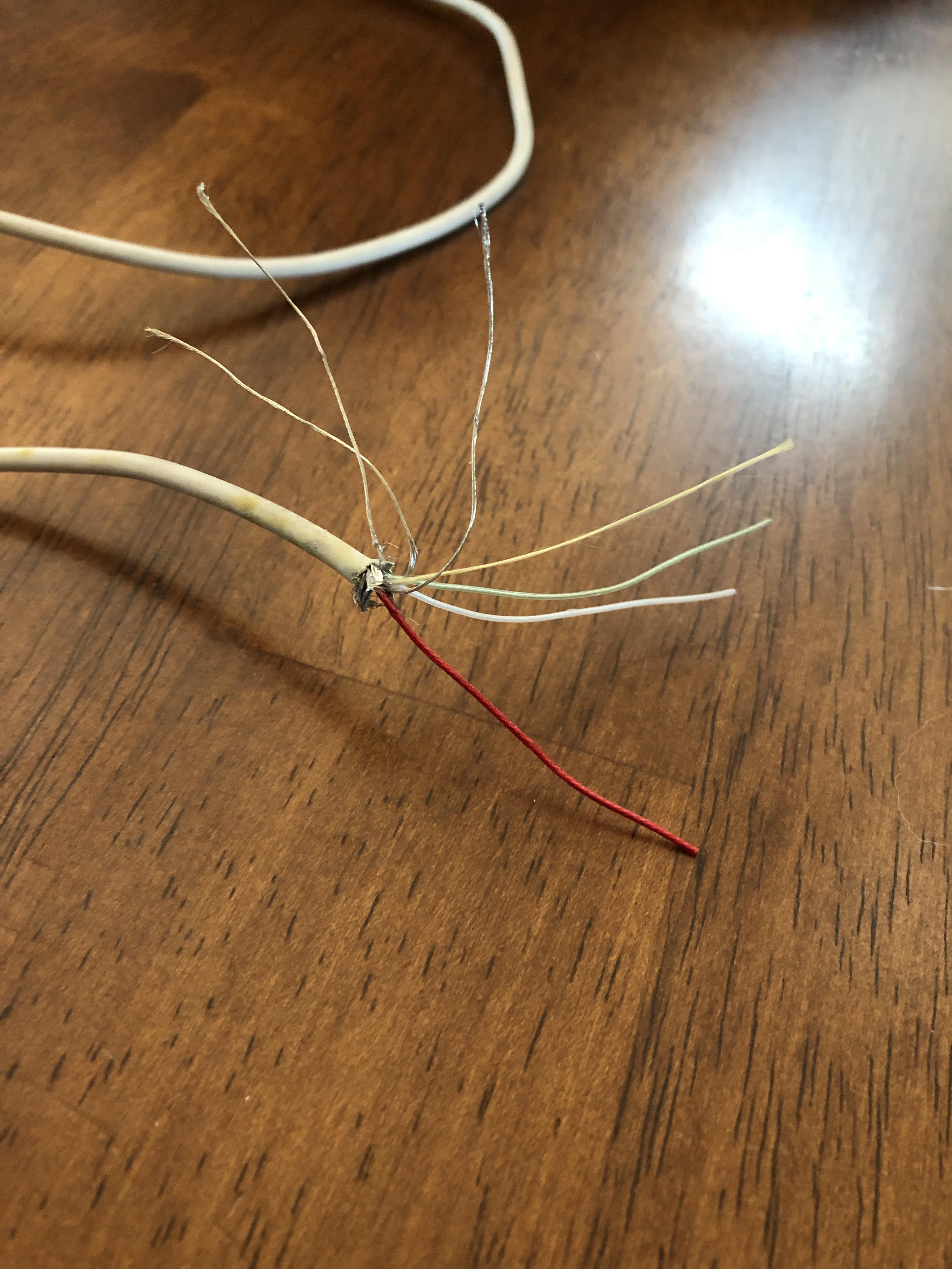 Help identifying what wires are what in an apple iphone charger. I know