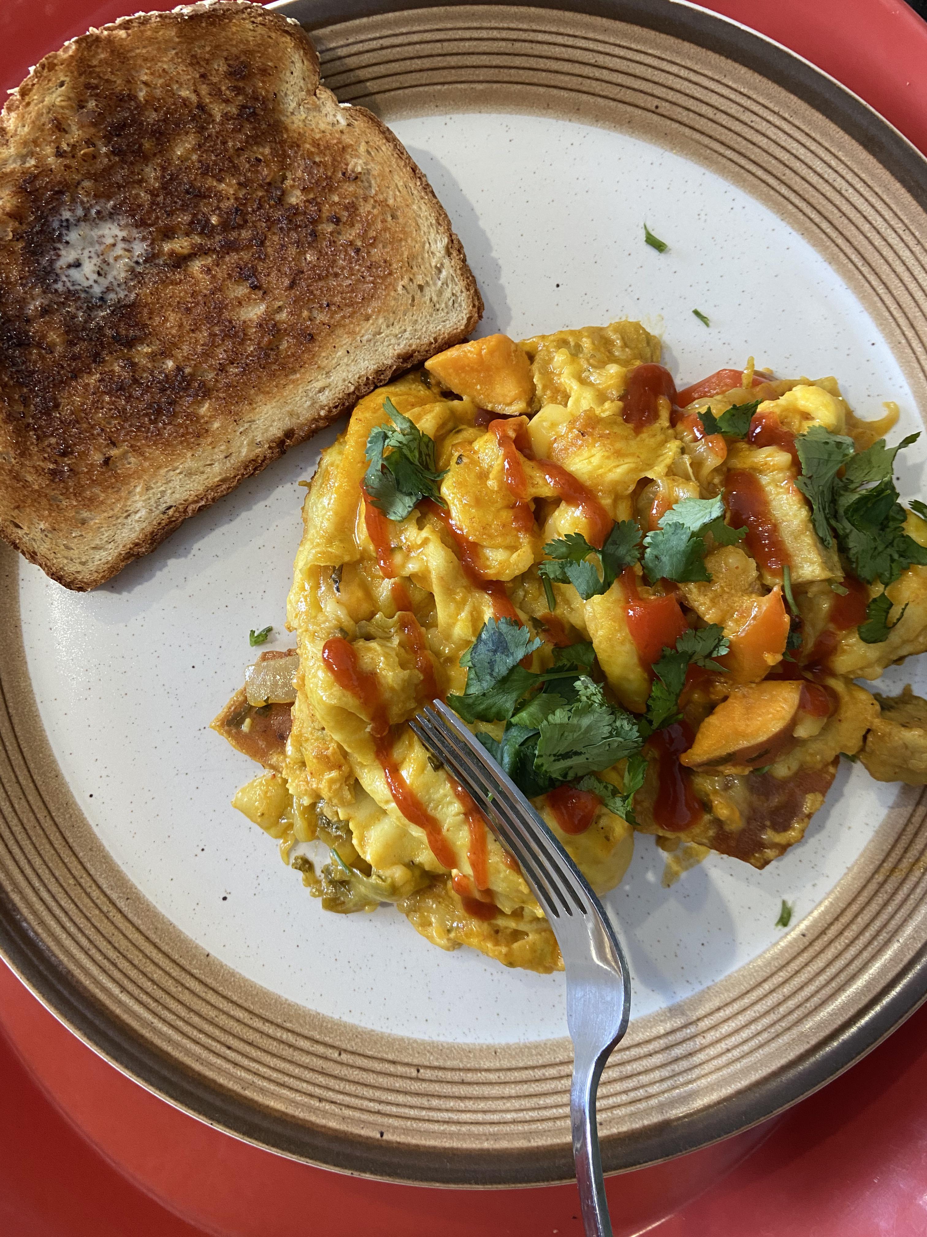 Repurposing leftovers. Huge Thai curry breakfast scramble made with