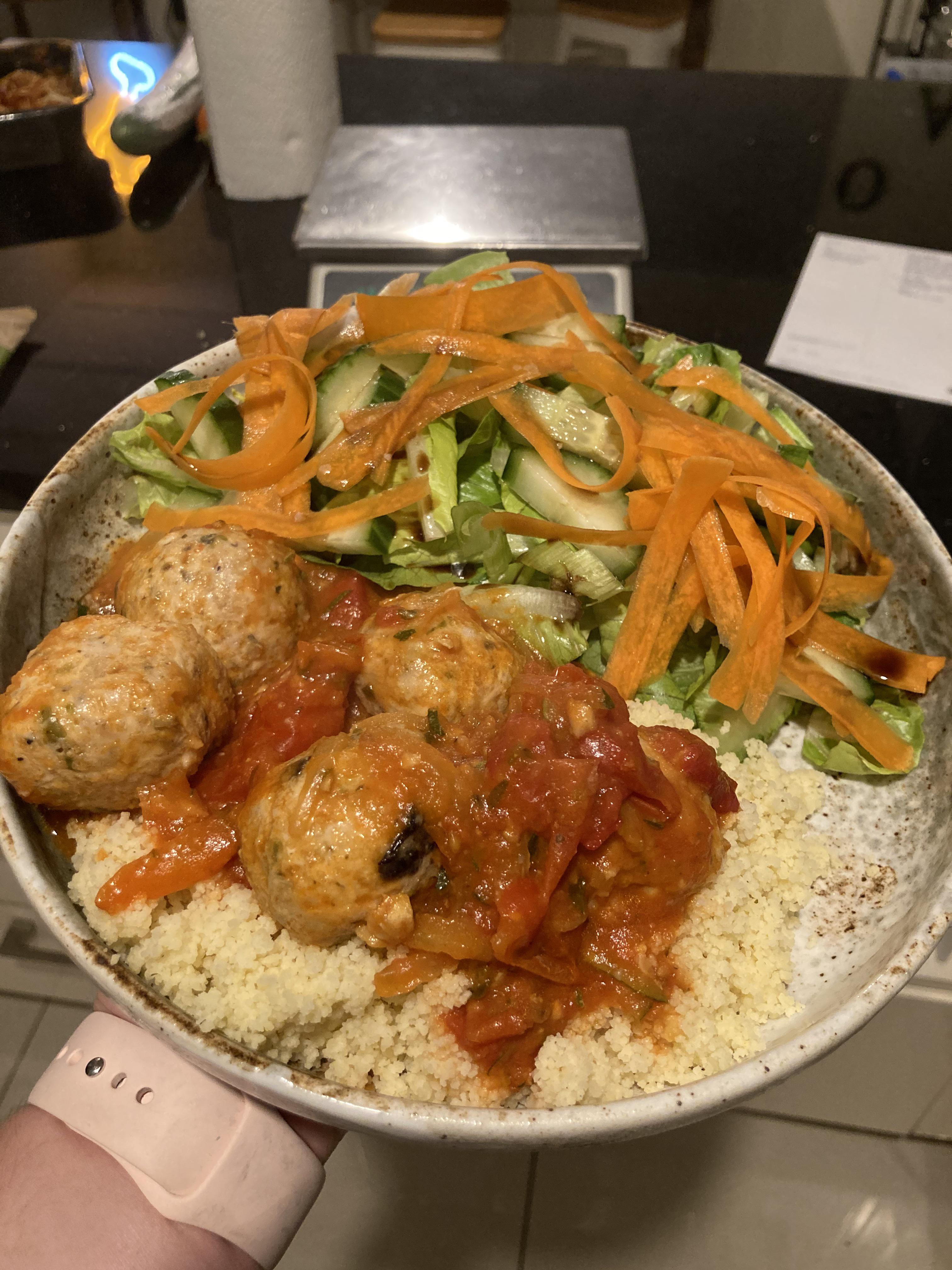 Chicken and olive meatballs on couscous with a big salad. 622calories