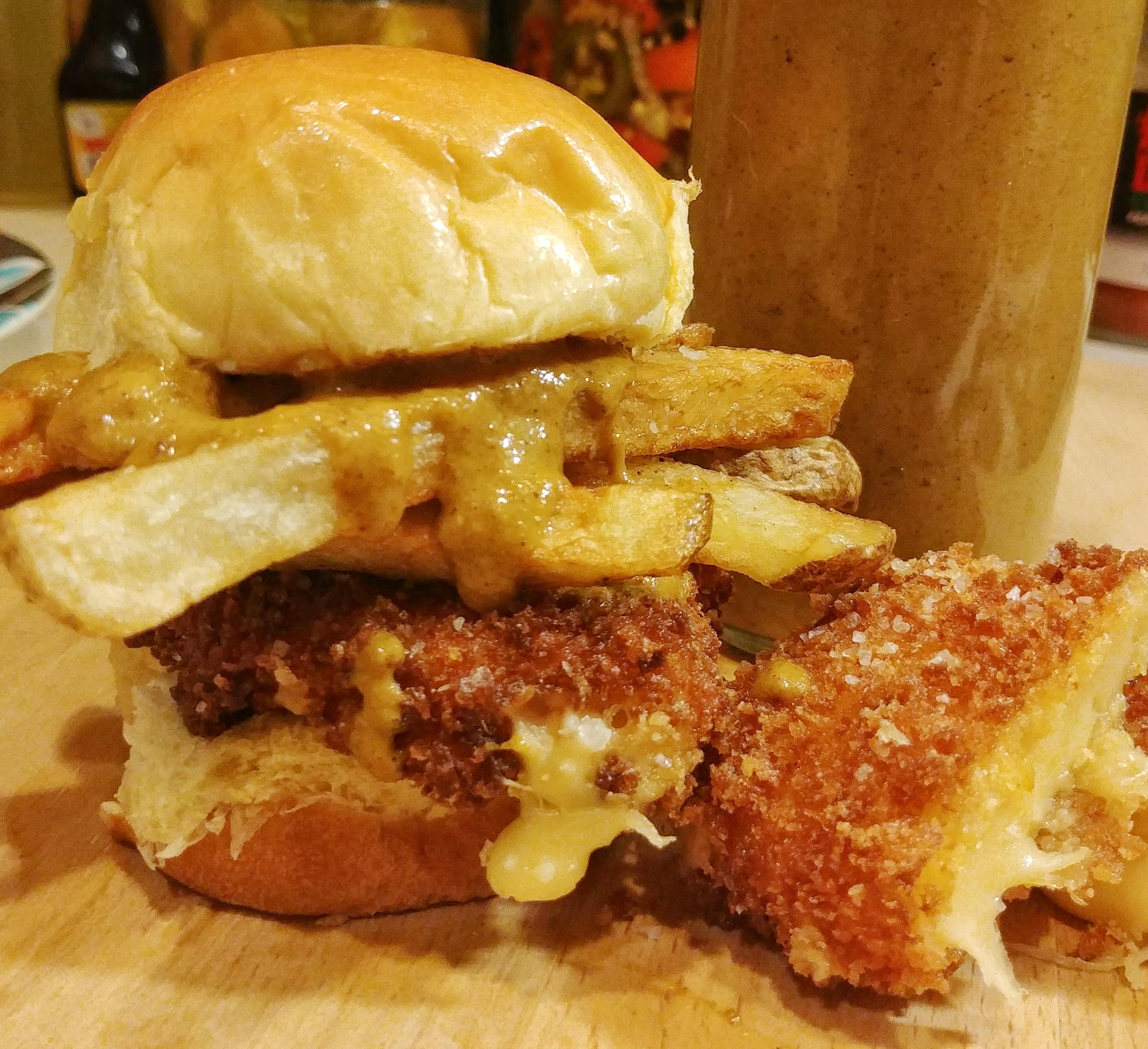 Curry On Wayward Spuds twicefried chips, curry sauce, & deepfried