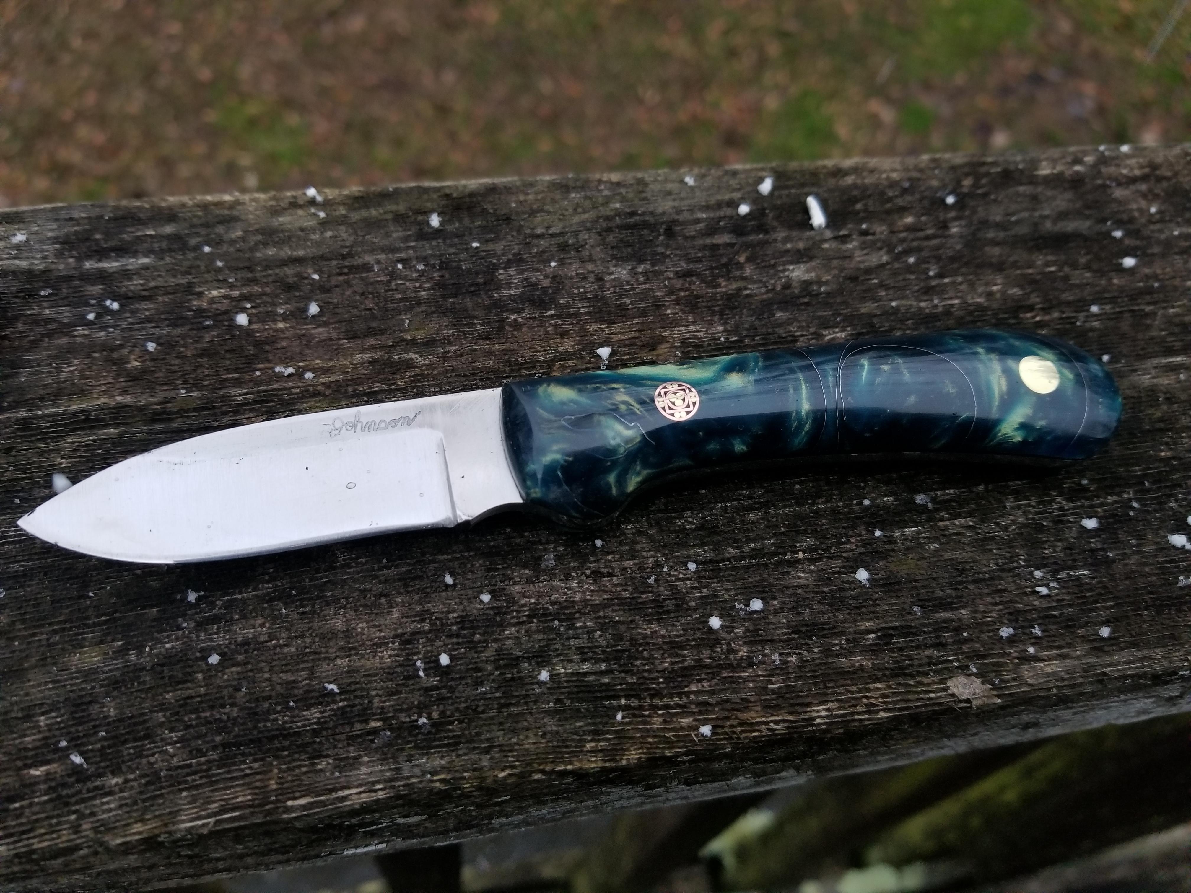 Finished this one up yesterday! 1084, and my own resin scales. r/knives