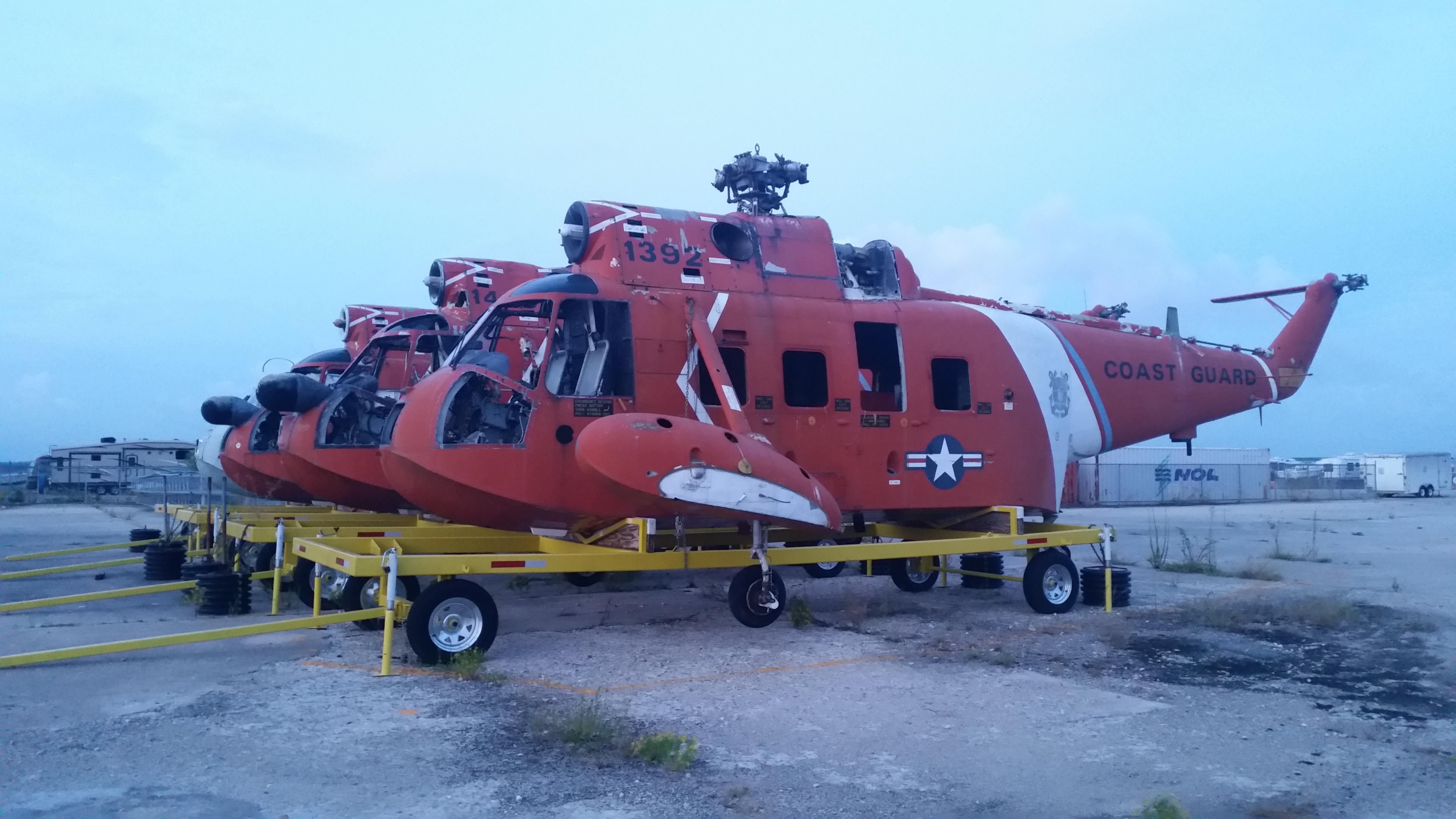 U.S. Coast Guard HH3 Pelican boneyard, Elizabeth City, NC [OC] [5312x2988] r/AbandonedPorn