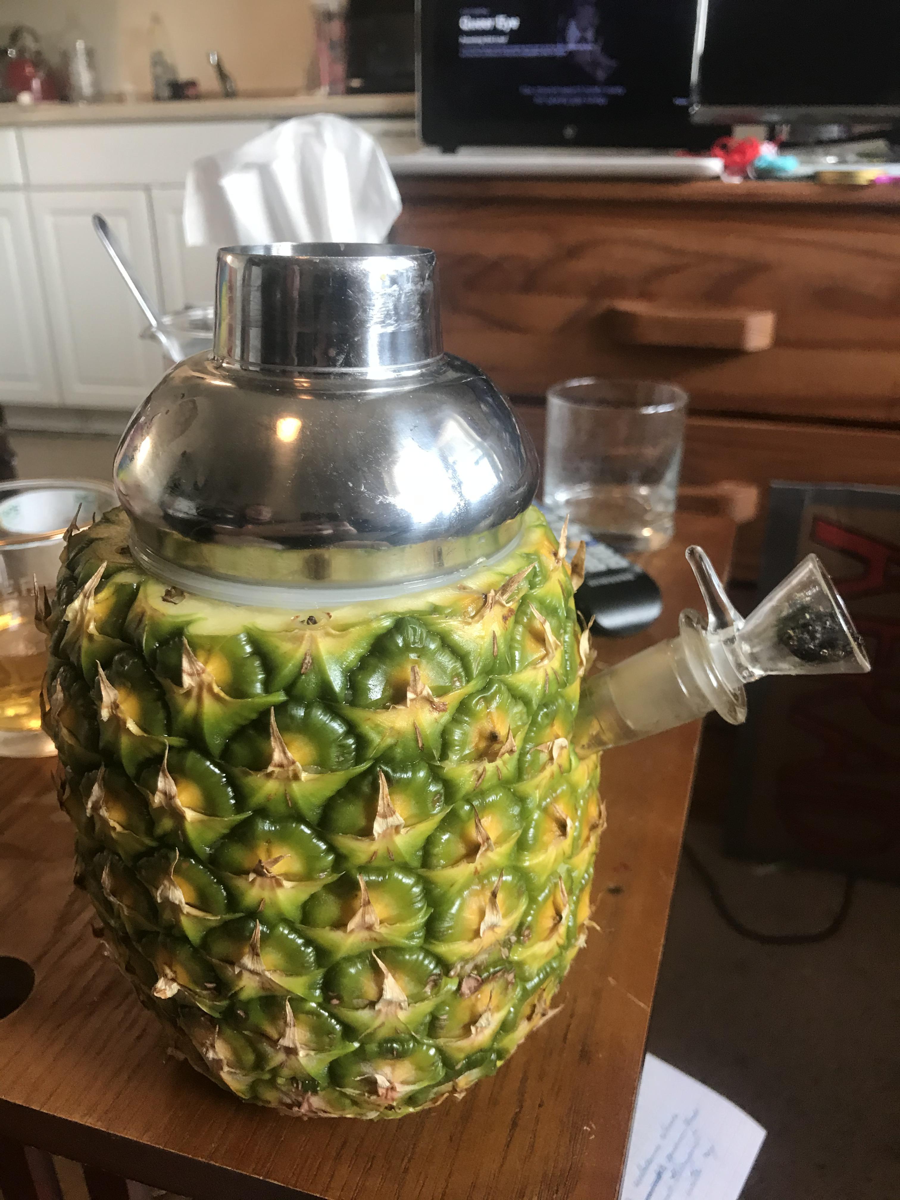 Hollowed out a pineapple and used the cap of a shaker to make a