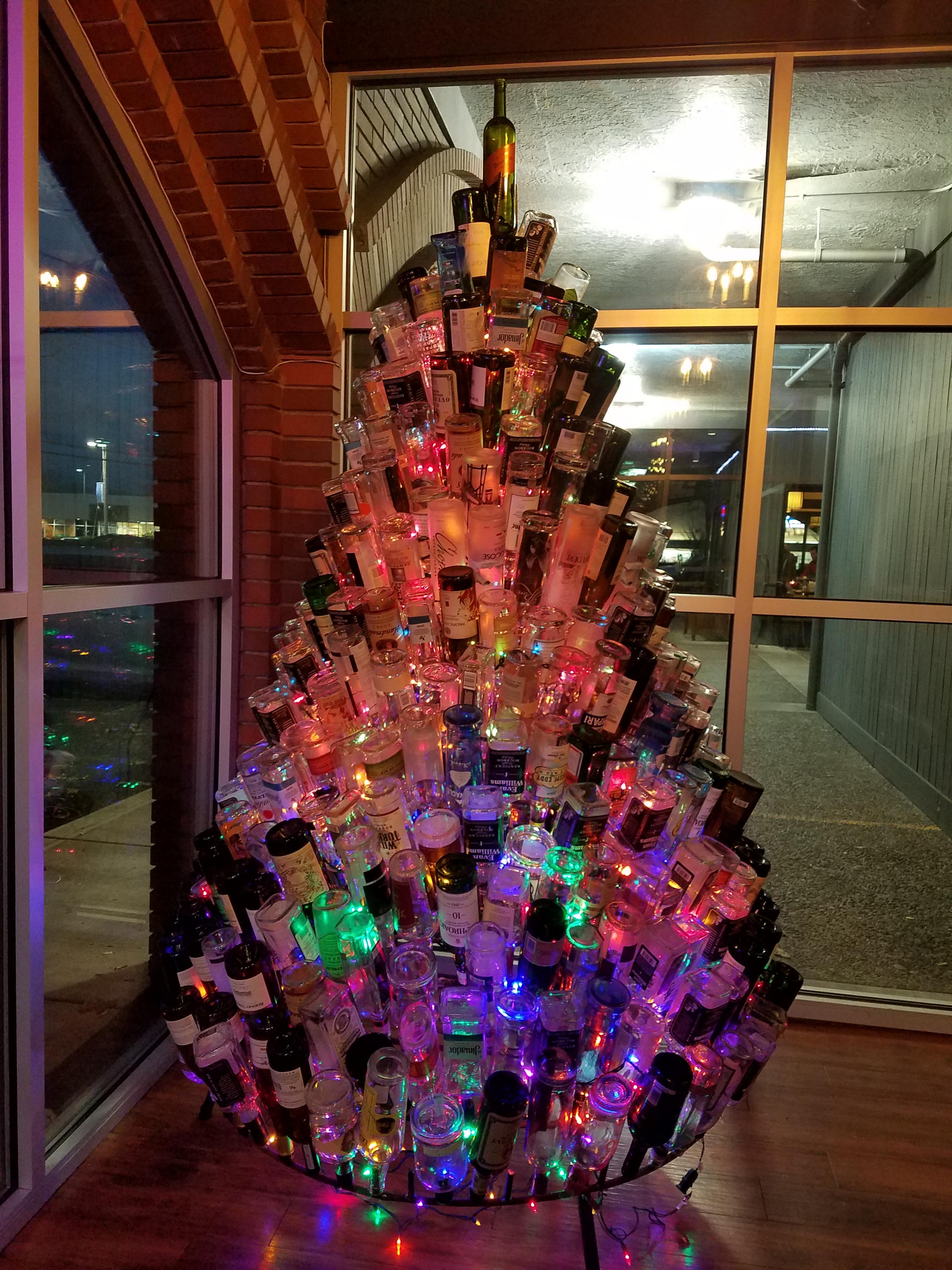 This booze bottle xmas tree at my favorite bar r/pics