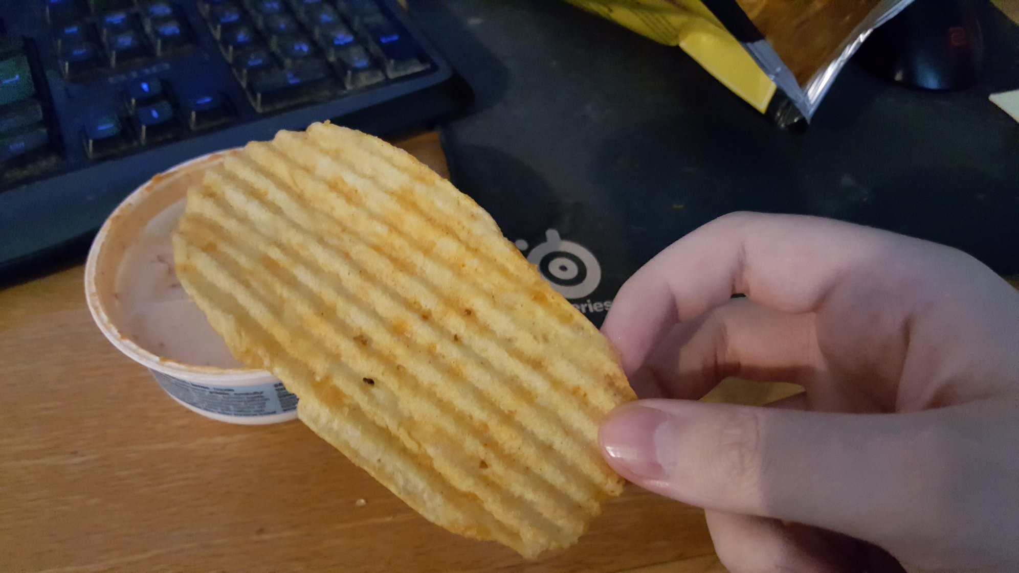 Found the largest potato chip I've ever seen in my bag (Size comparison