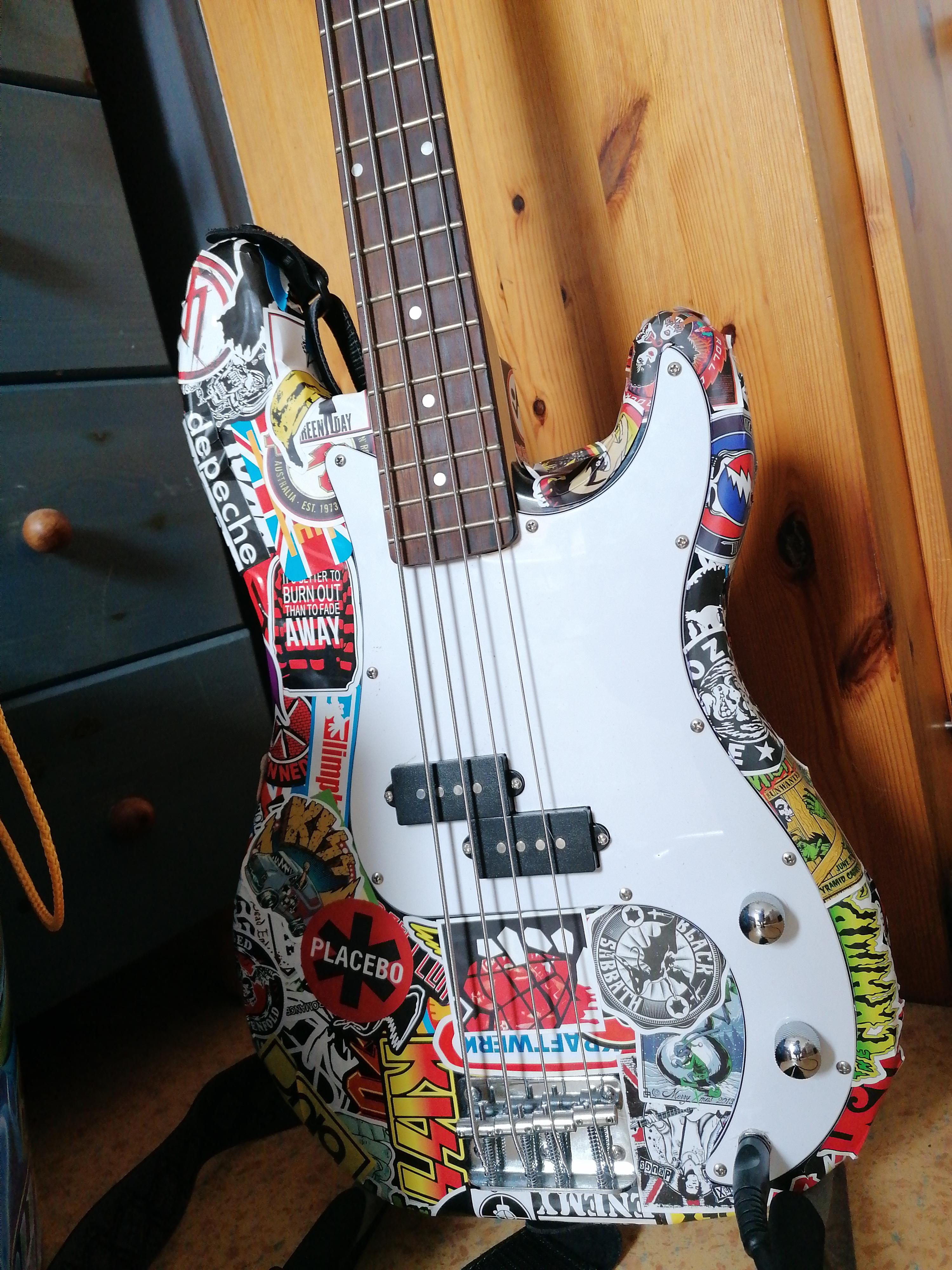 I've put some stickers on my bass, hope you like it r/BassGuitar