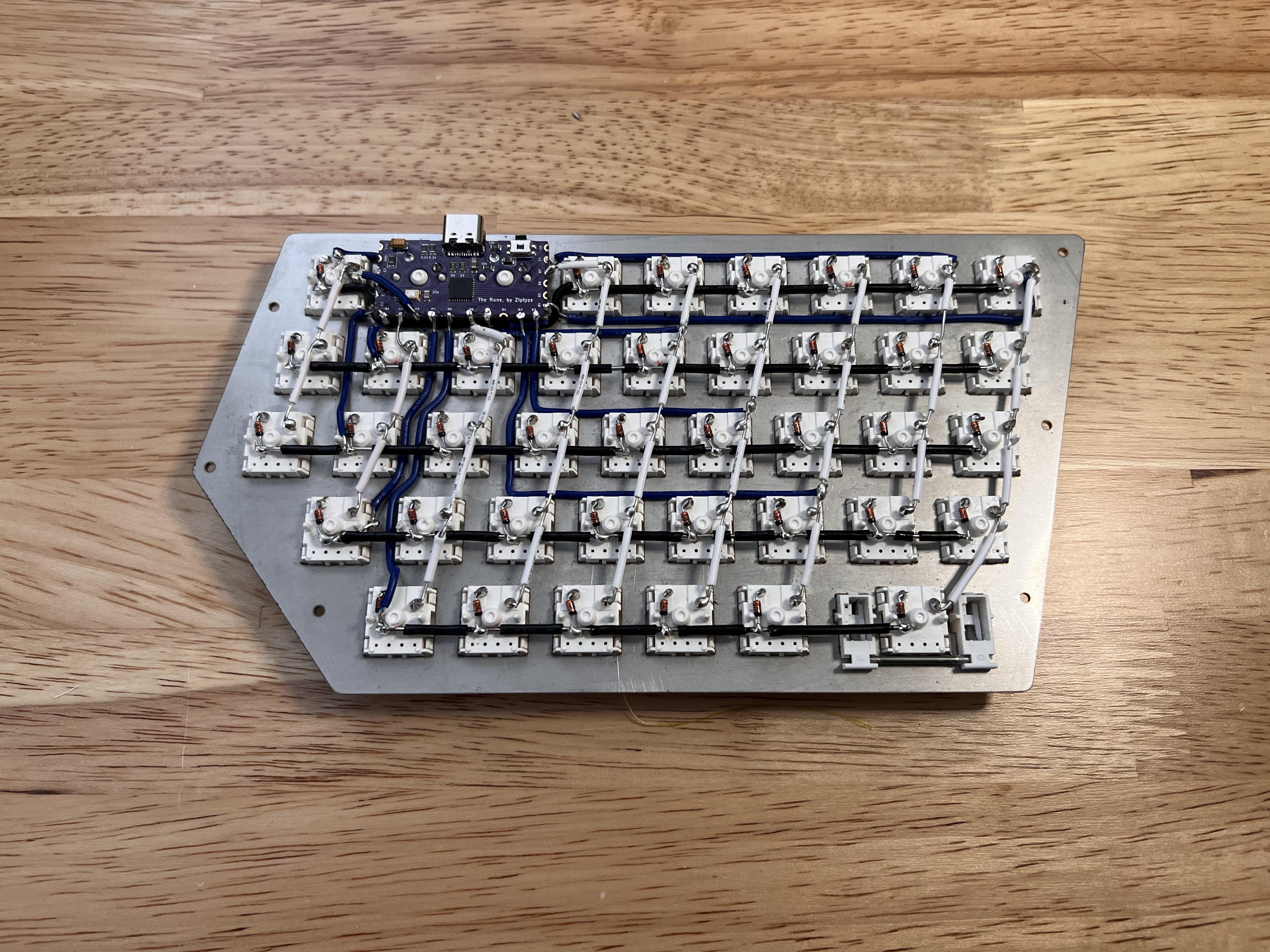 Excuse my godawful soldering, but I think my first handwired keyboard came out worthy of this
