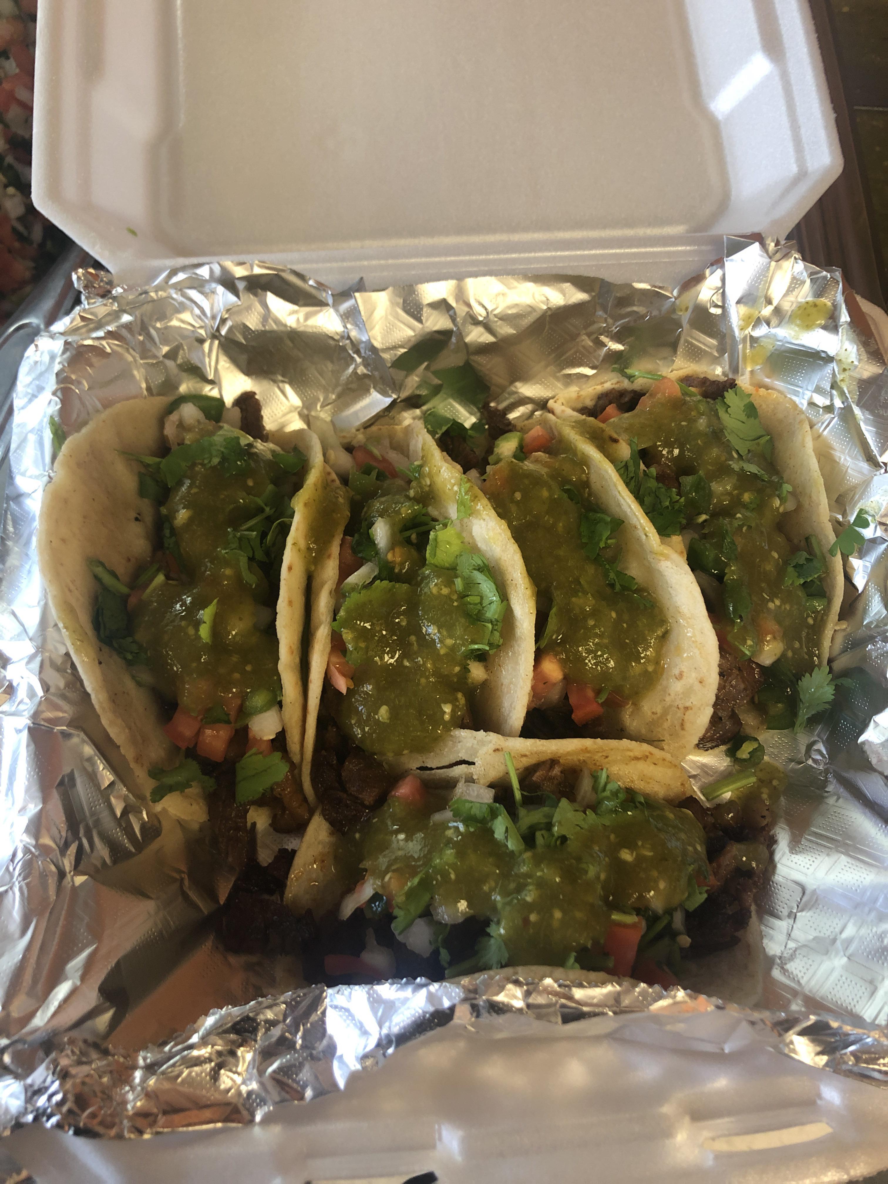 Steak Taco with cilantro, pico de gallo, squeezed lime, onion, and