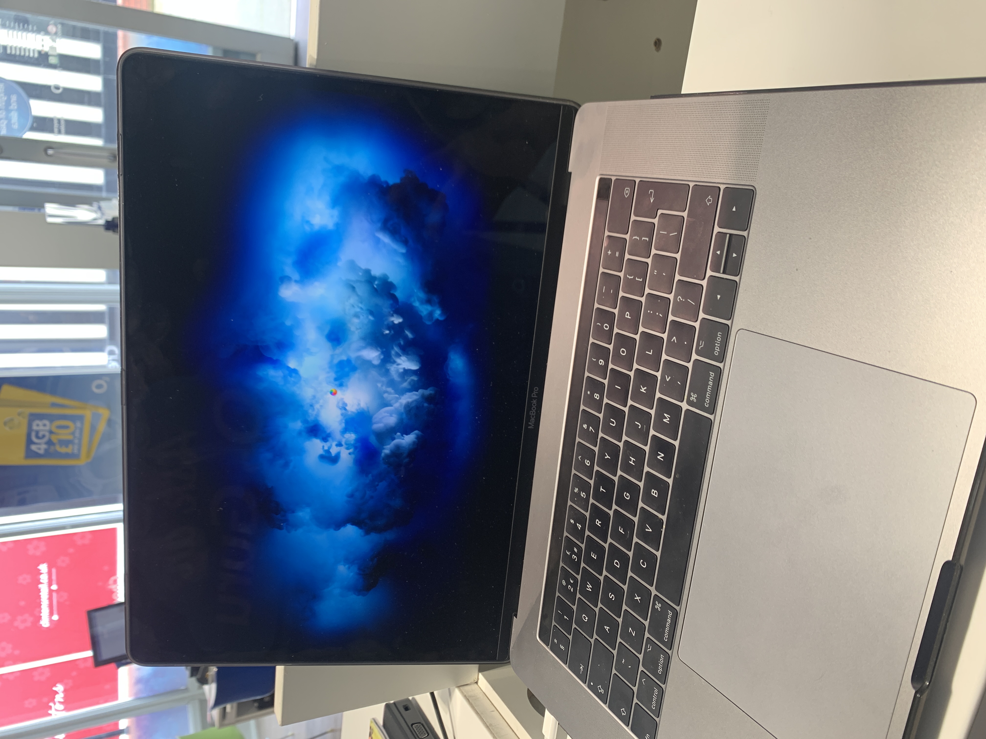 MacBook 15” touchbar keeps flickering on and off. (Not a screen issue