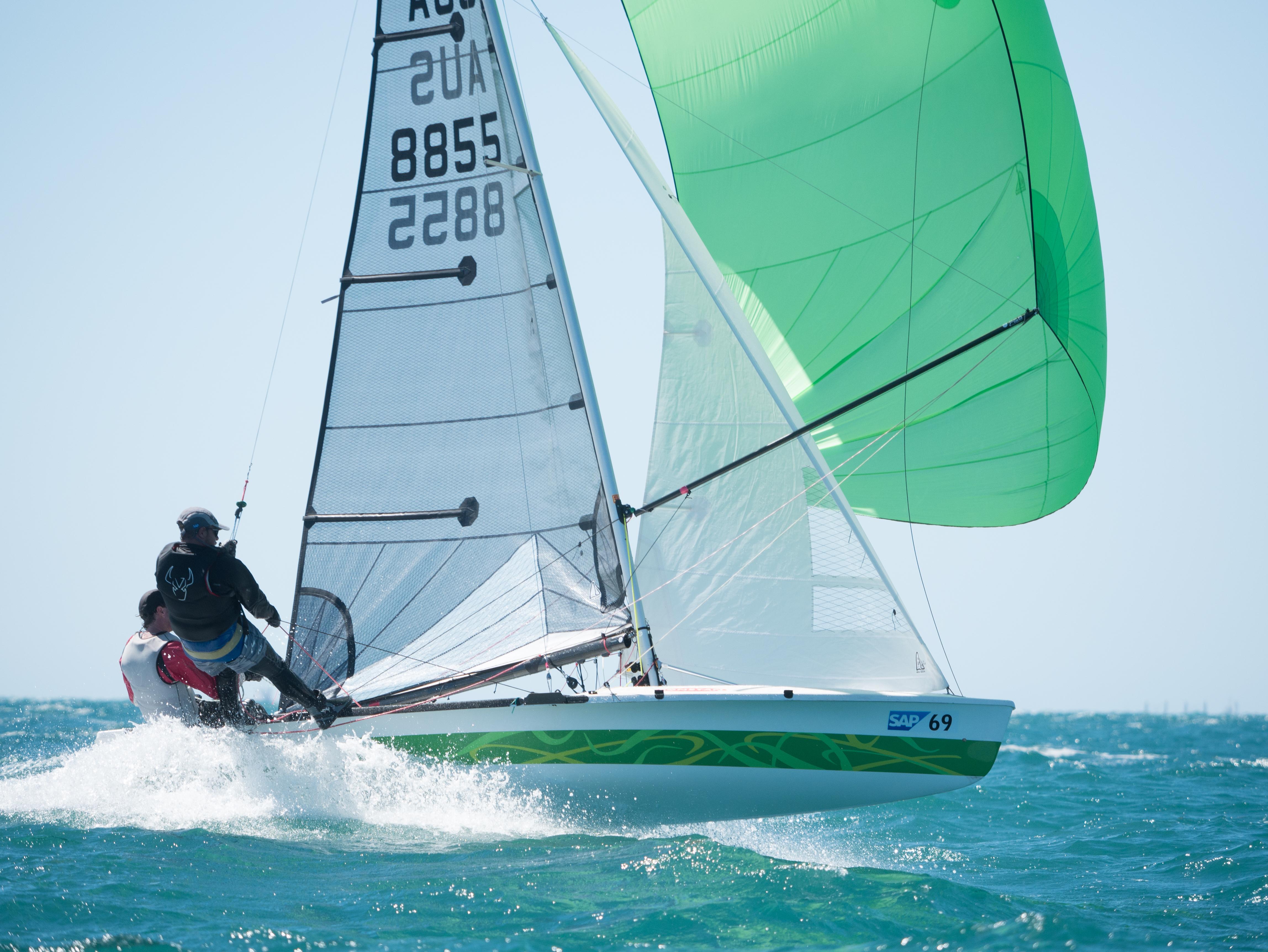 Launching down wind in a solid 20 knots at the International 505 World