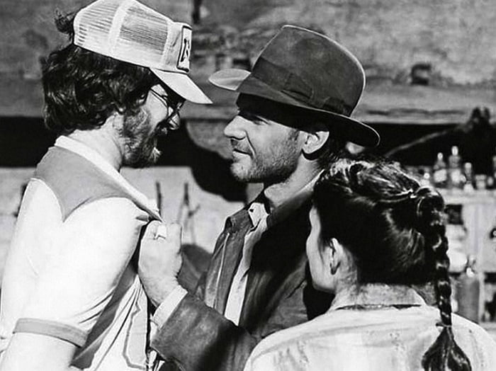 Steven Spielberg, Harrison Ford, and Karen Allen photographed on the