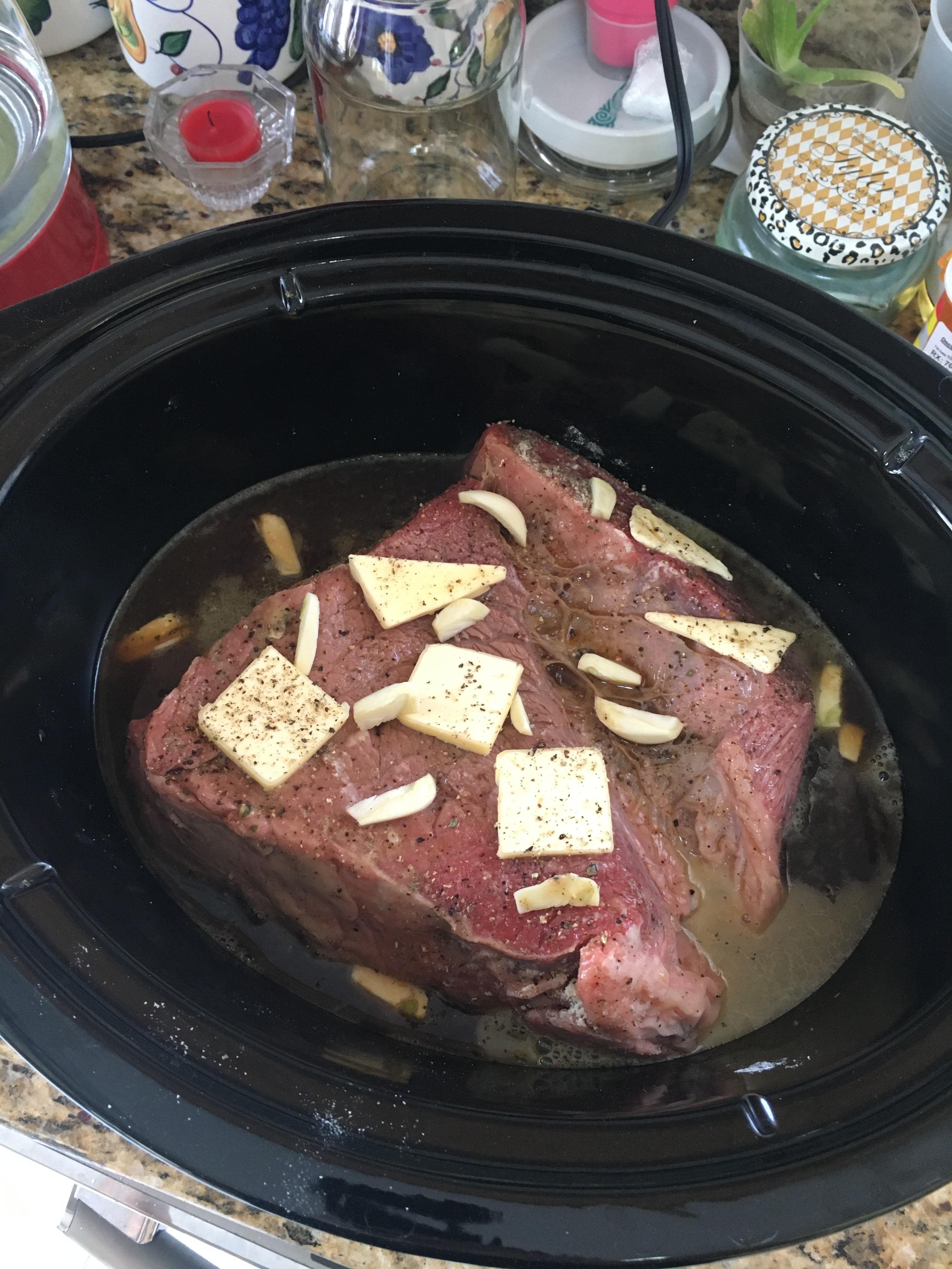 6 hours on high for a Chuck Roast with a Ranch Packet, 1/2 stick of