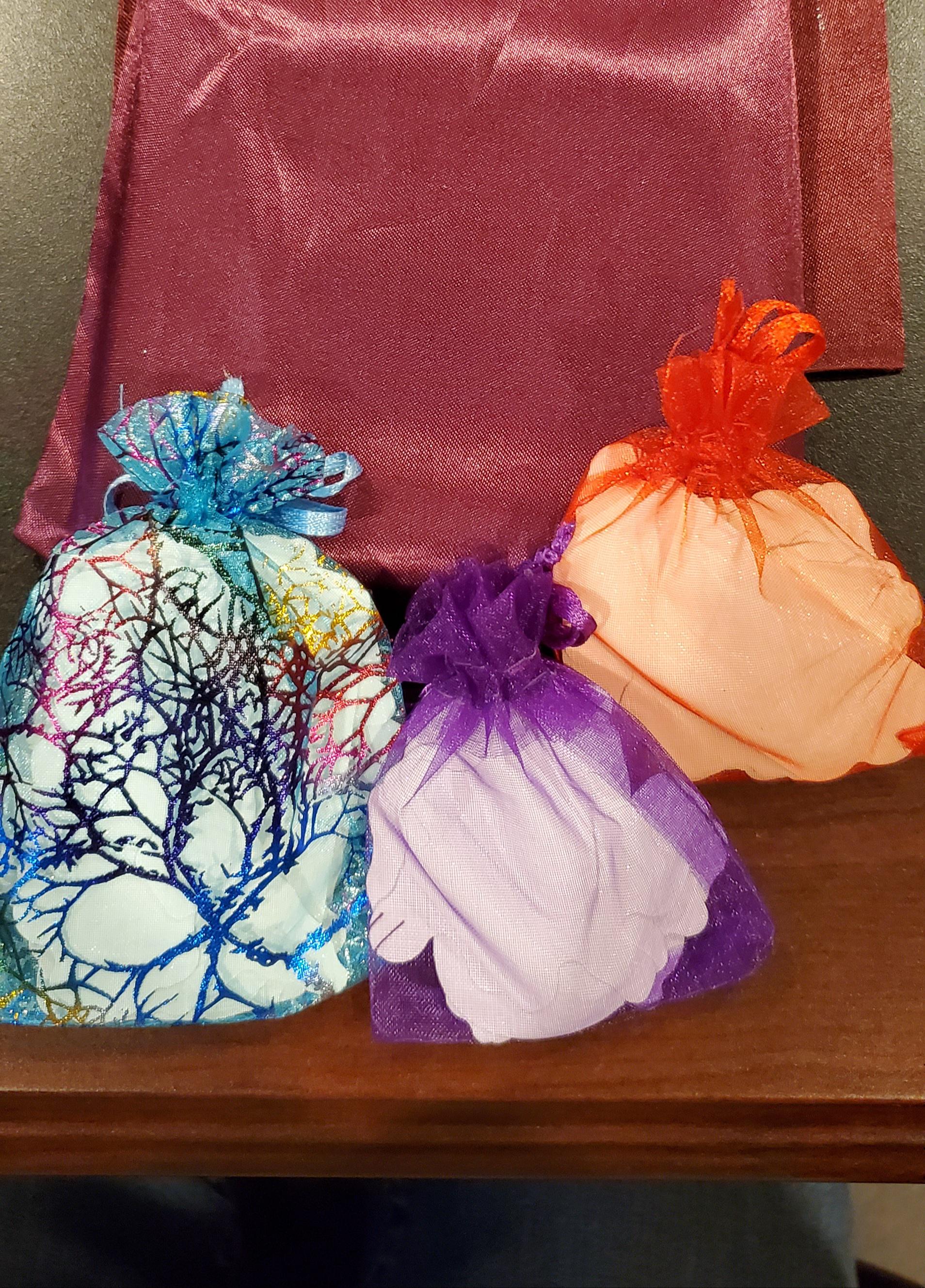 How do you wrap stickers? In cute little organza bags of course. I had