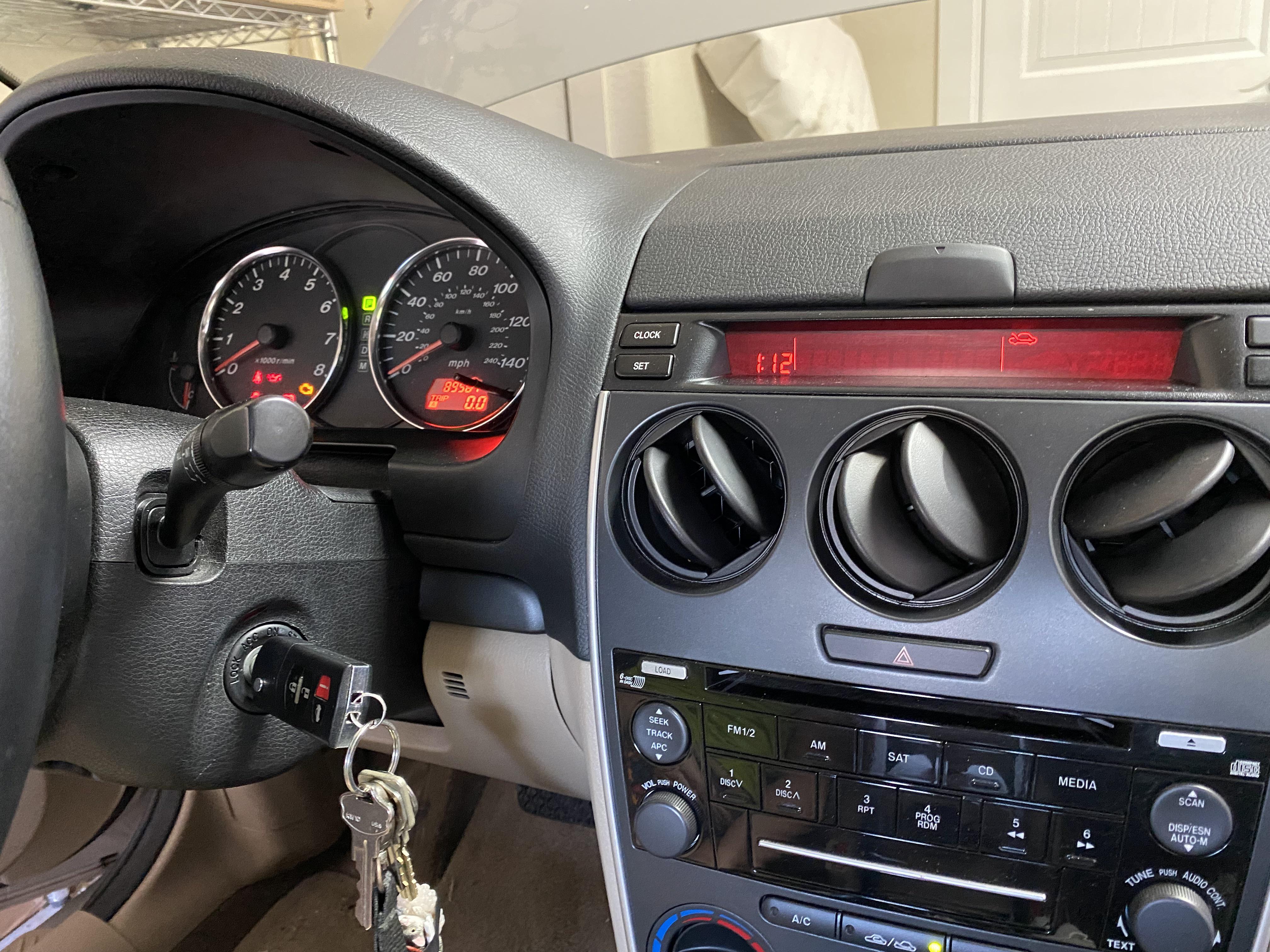 Car not starting. Older Mazda. Lights come on after a few seconds with