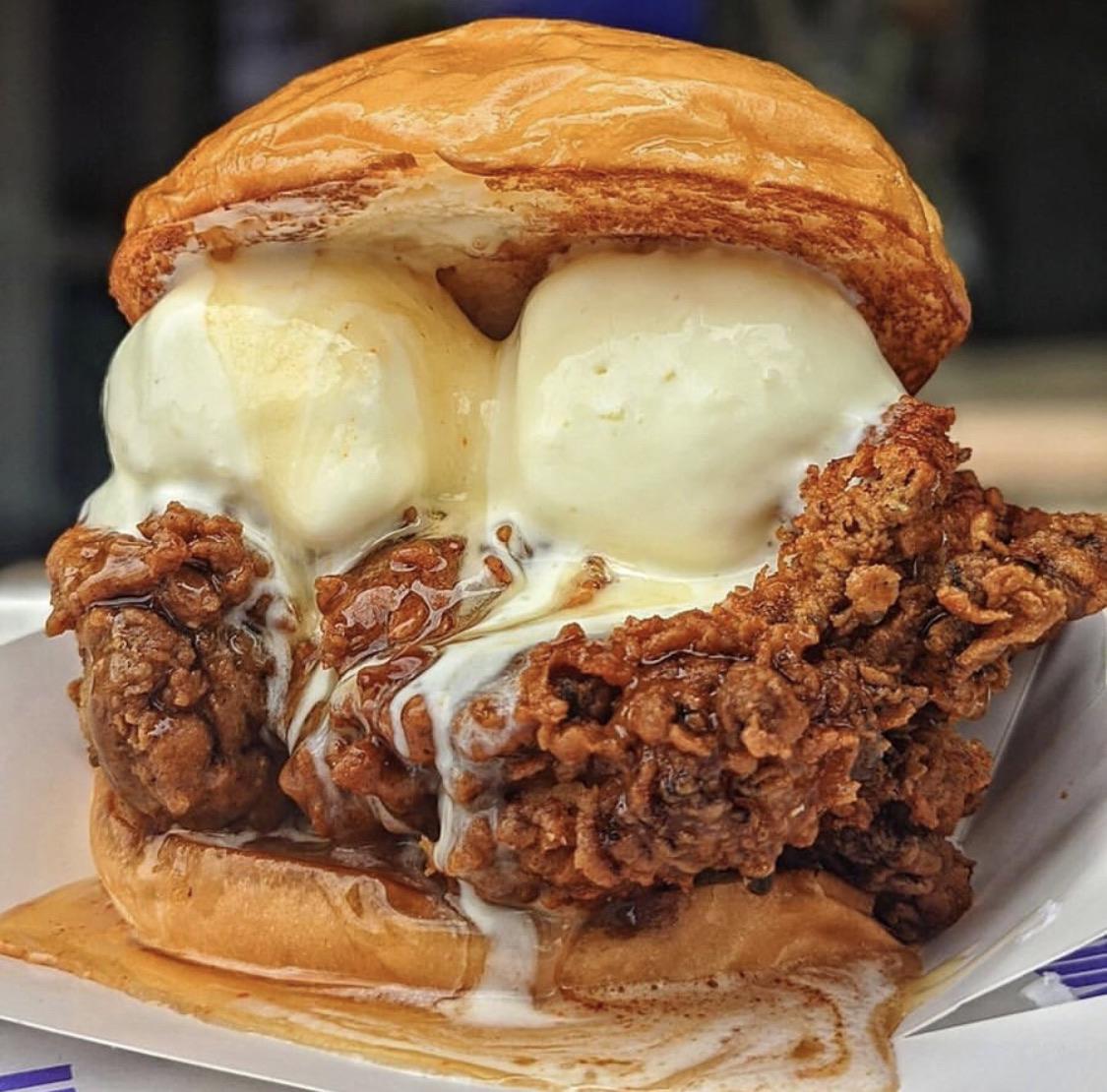 Chicken sandwich with ice cream with syrup on the side) r