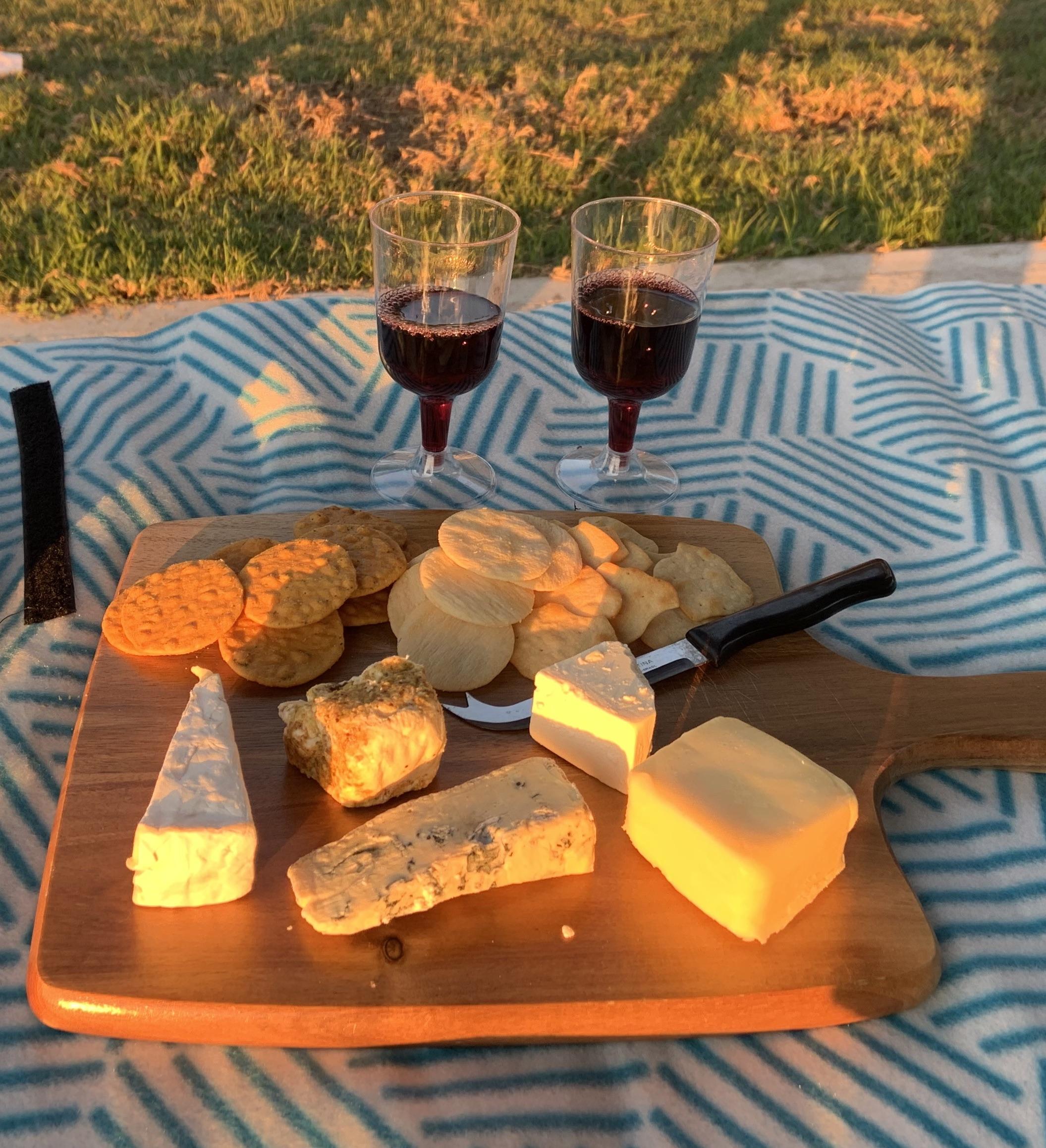 Little cheese board picnic in the sunset ) r/food