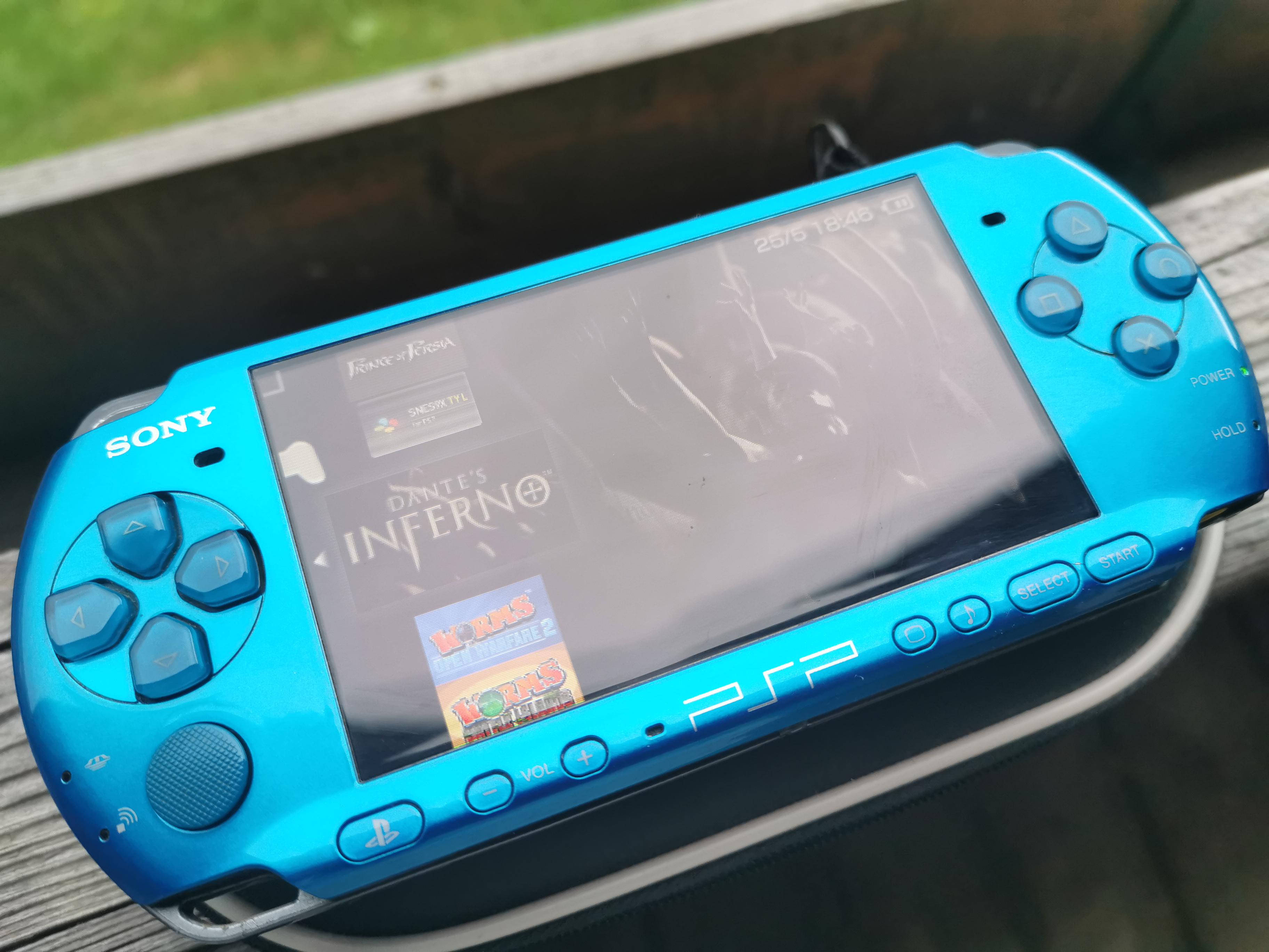 PSP 3004 with one of my favourite games Dantes Inferno. (also hello i am new here and too