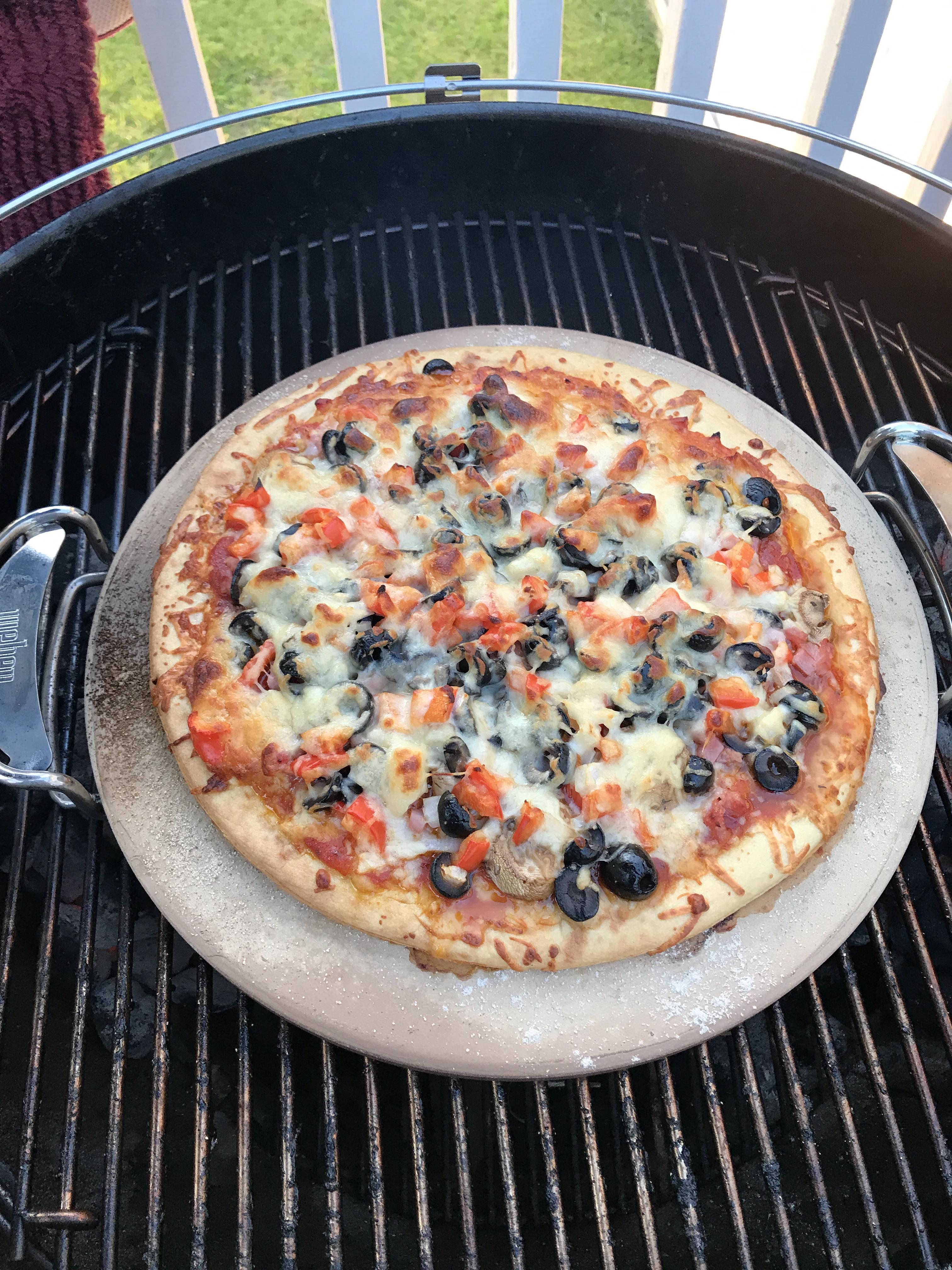 Broke in my new er pizza stone this evening. Was definitely a hit