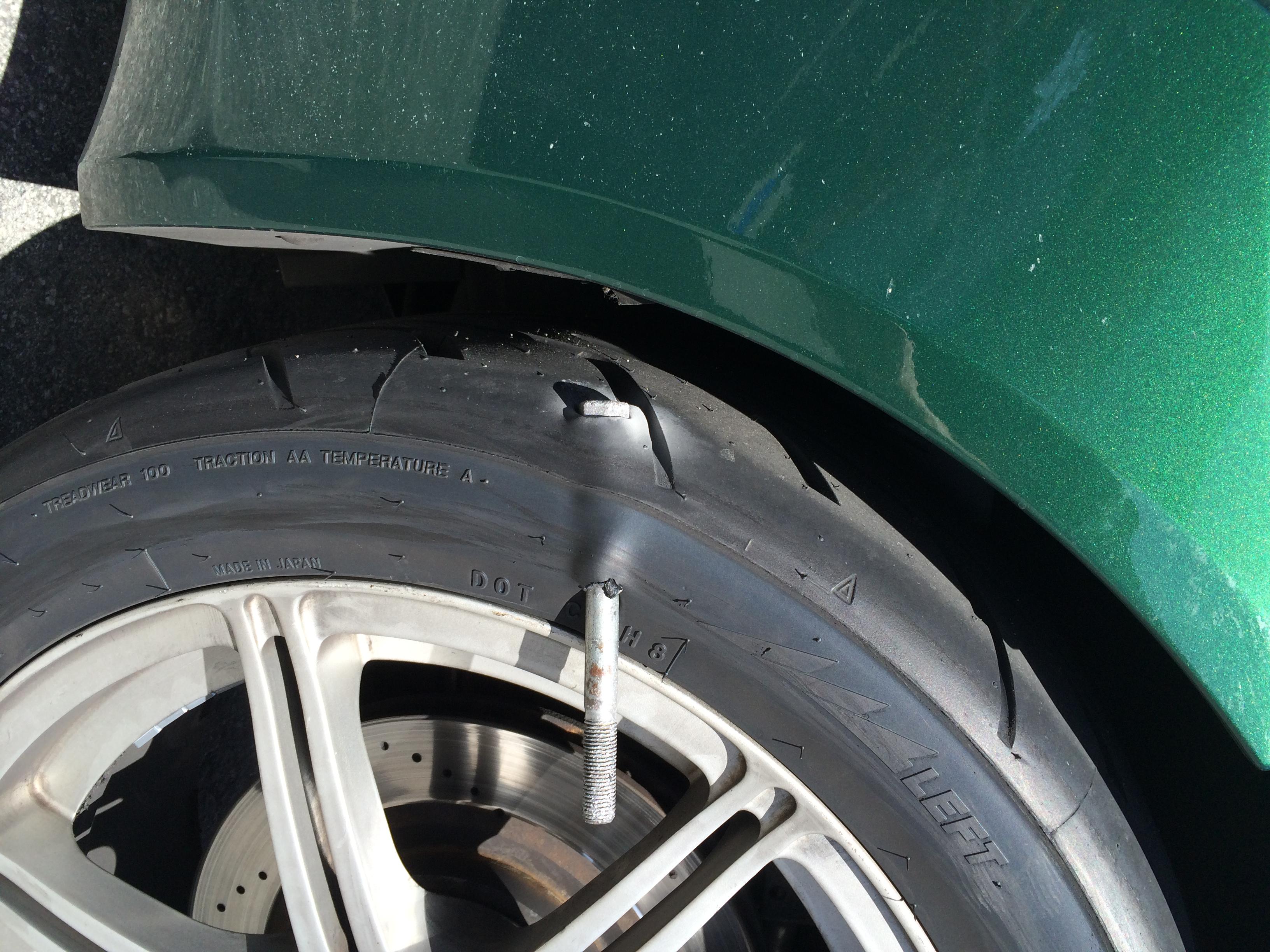 "Funny clicking noise coming from the back." Tire still holding air