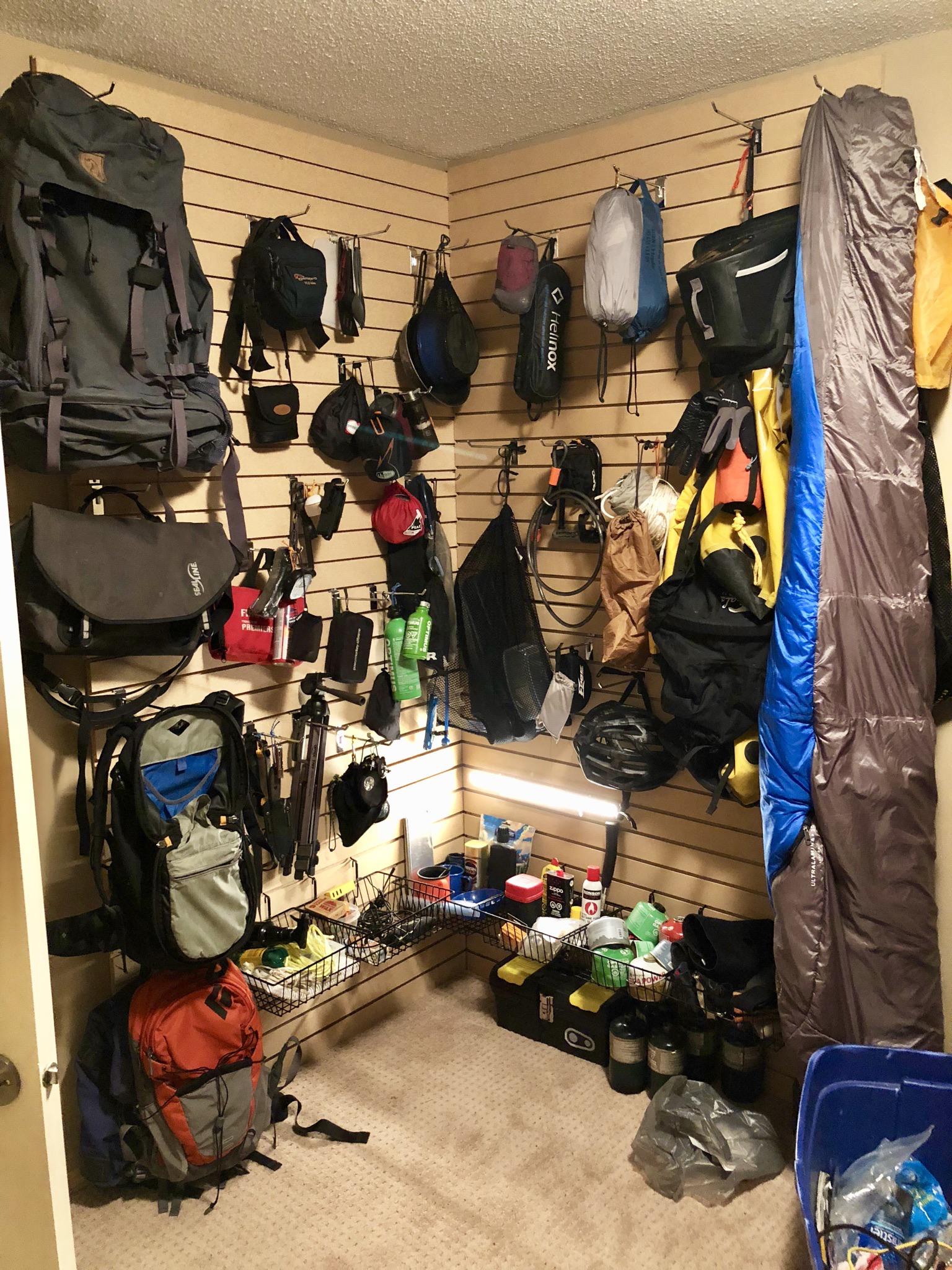Cheap and efficient gear storage for my small condo. Slatwall and hooks