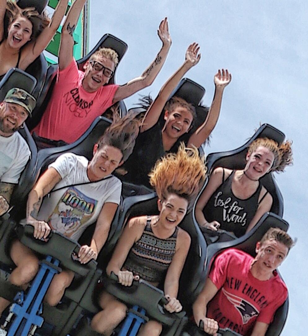 The terrified faces in the front row of this vertical roller coaster