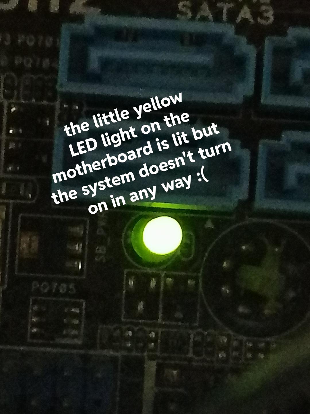 An old ASUS motherboard here. The motherboard has a little yellow LED