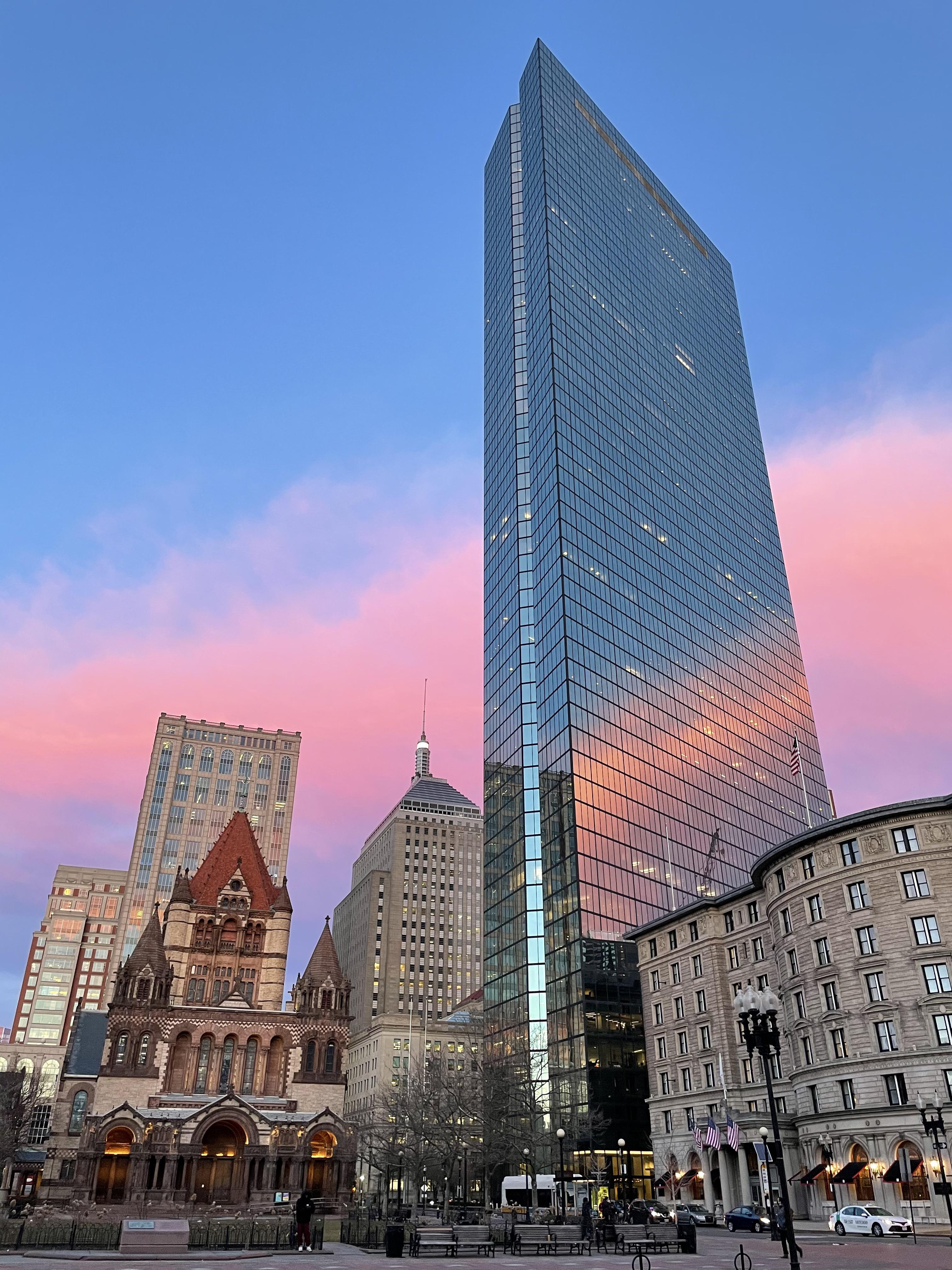 Sun setting on the Hancock Tower r/boston