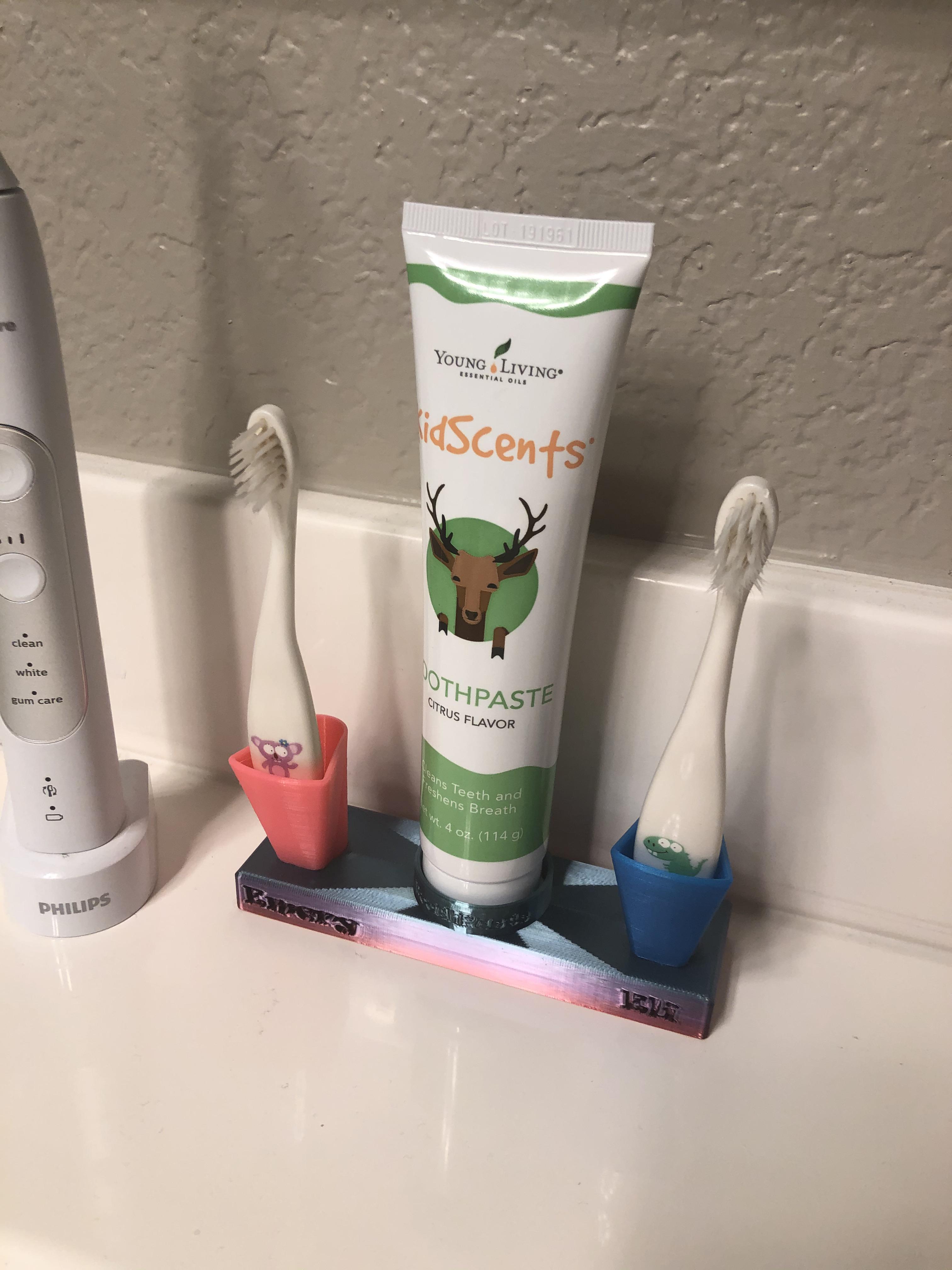 Designed and printed a custom toothbrush /toothpaste holder for the kids. r/functionalprint