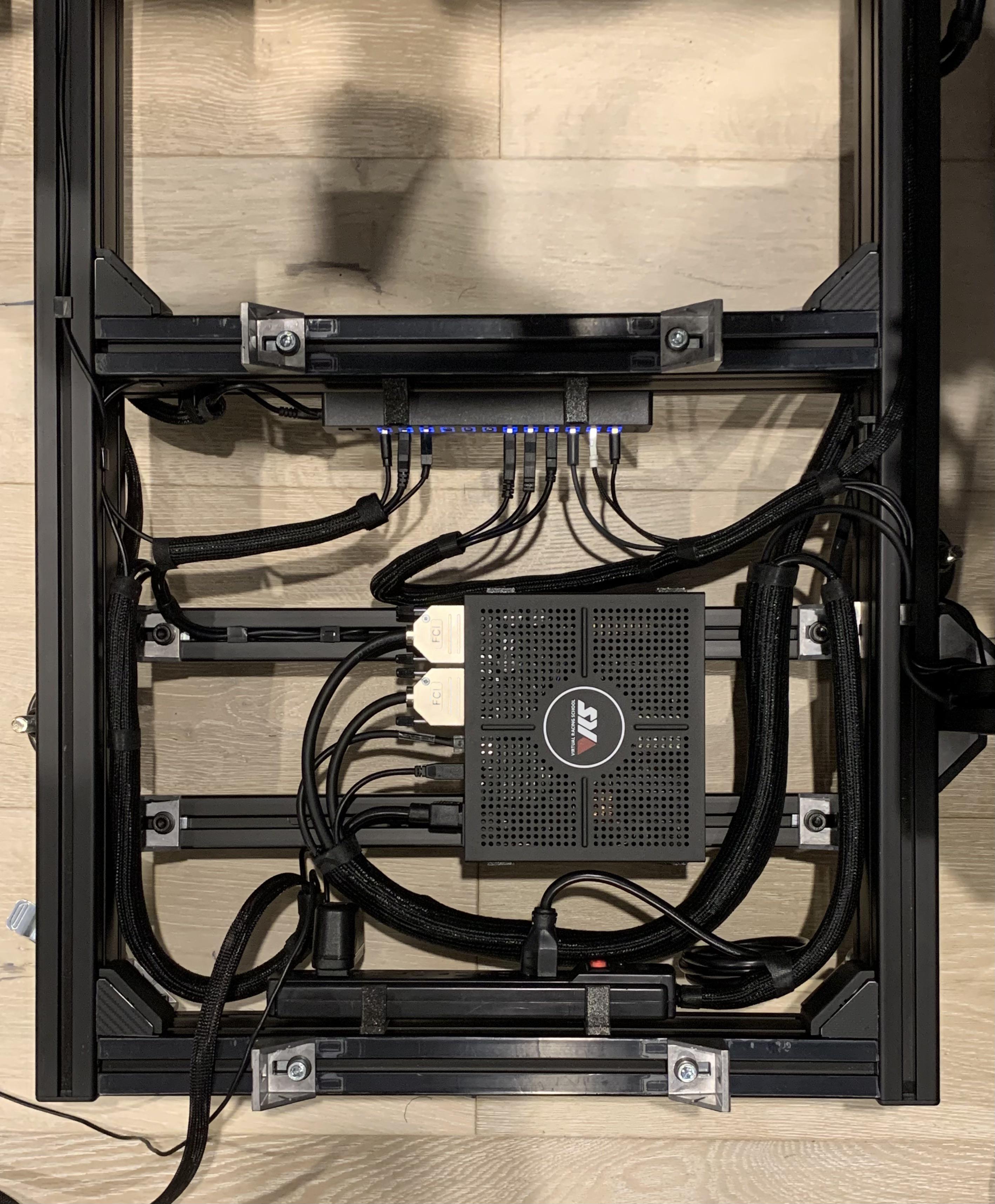 Cable management under the seat. Seat was removed to mount my wheelbase