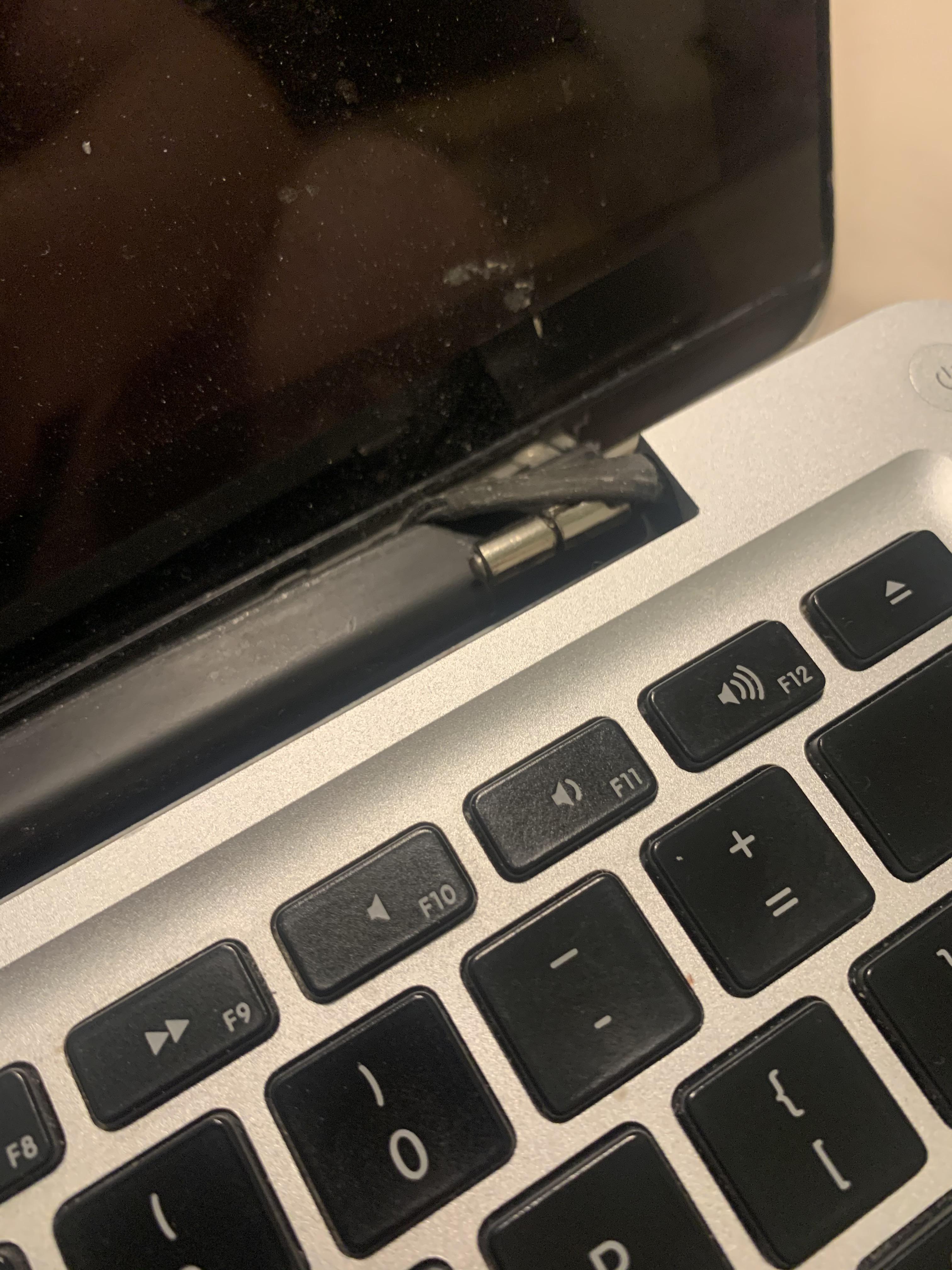 Dropped macbook. How easy of a fix is this? Can anyone a