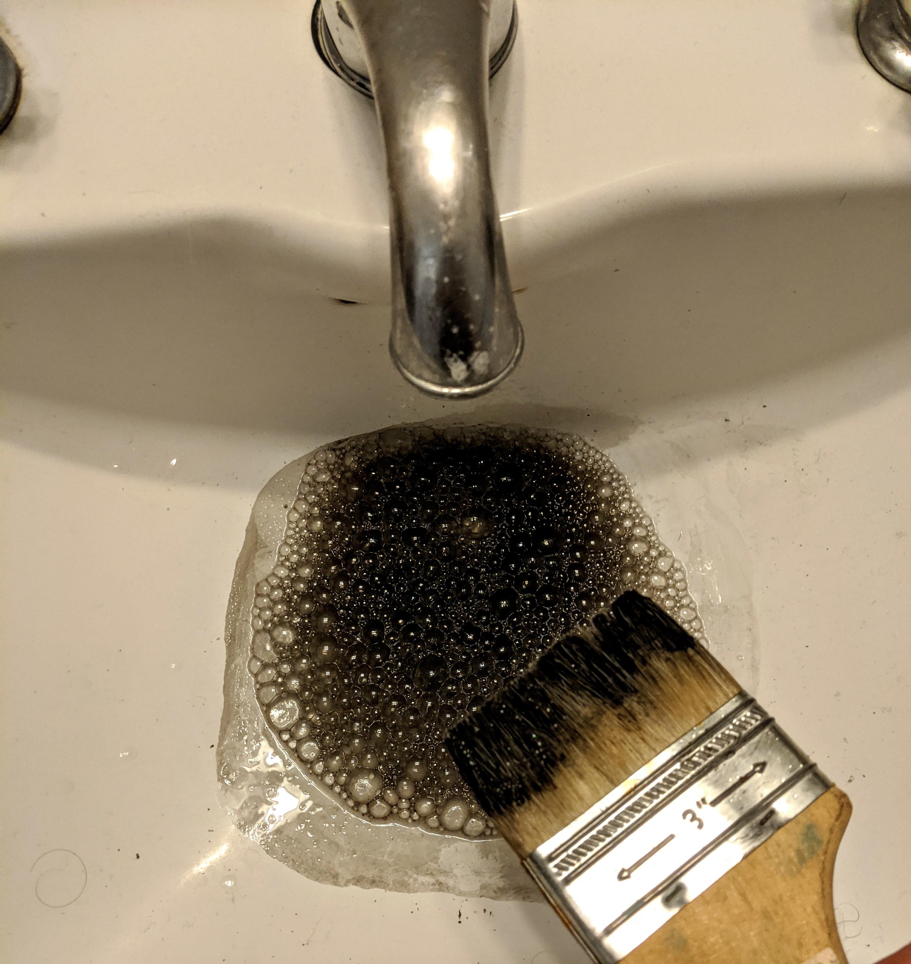 My tap water has turned black because I am washing a paint brush r/notinteresting