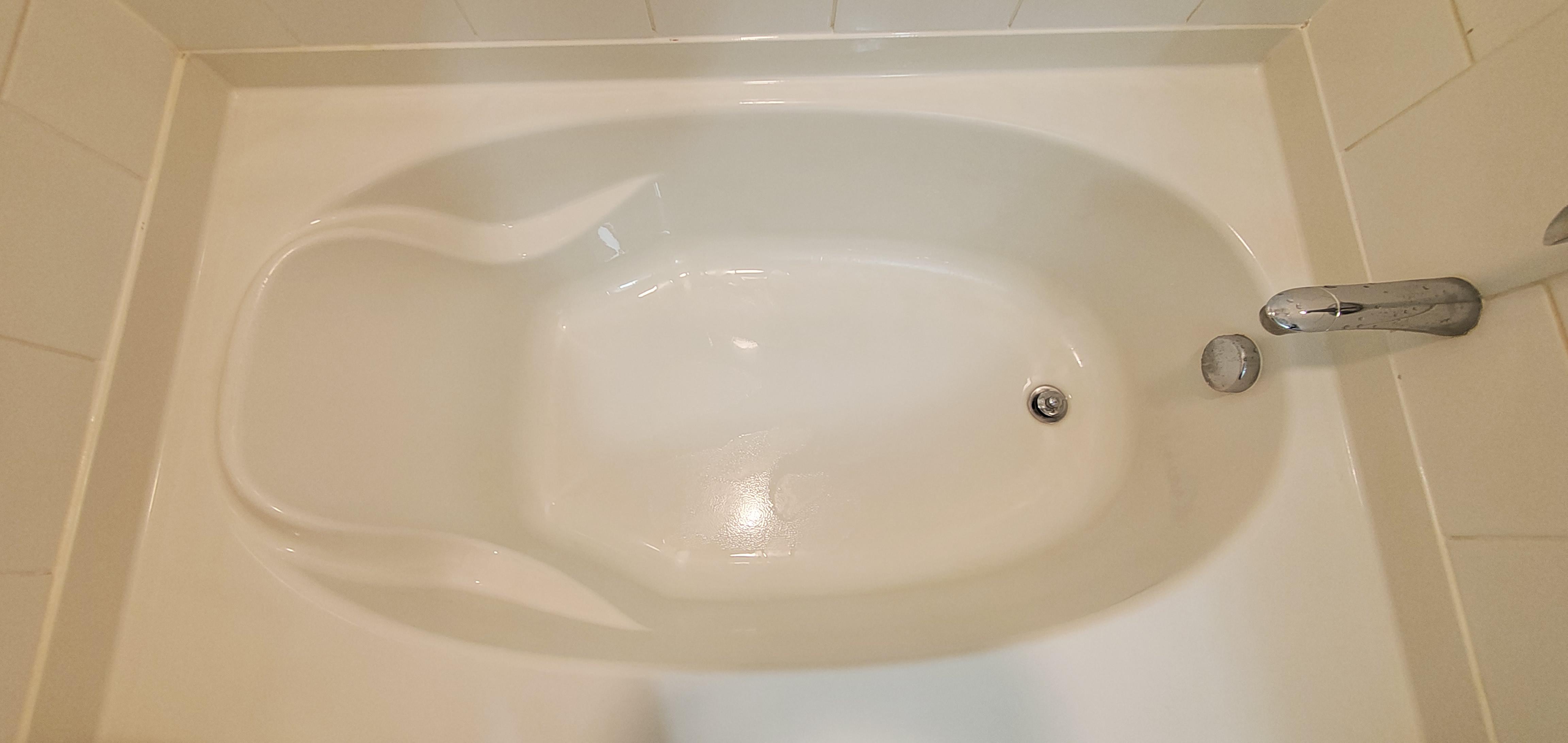 I'm the same guy with black spots on my bath tub. Just wanted to make