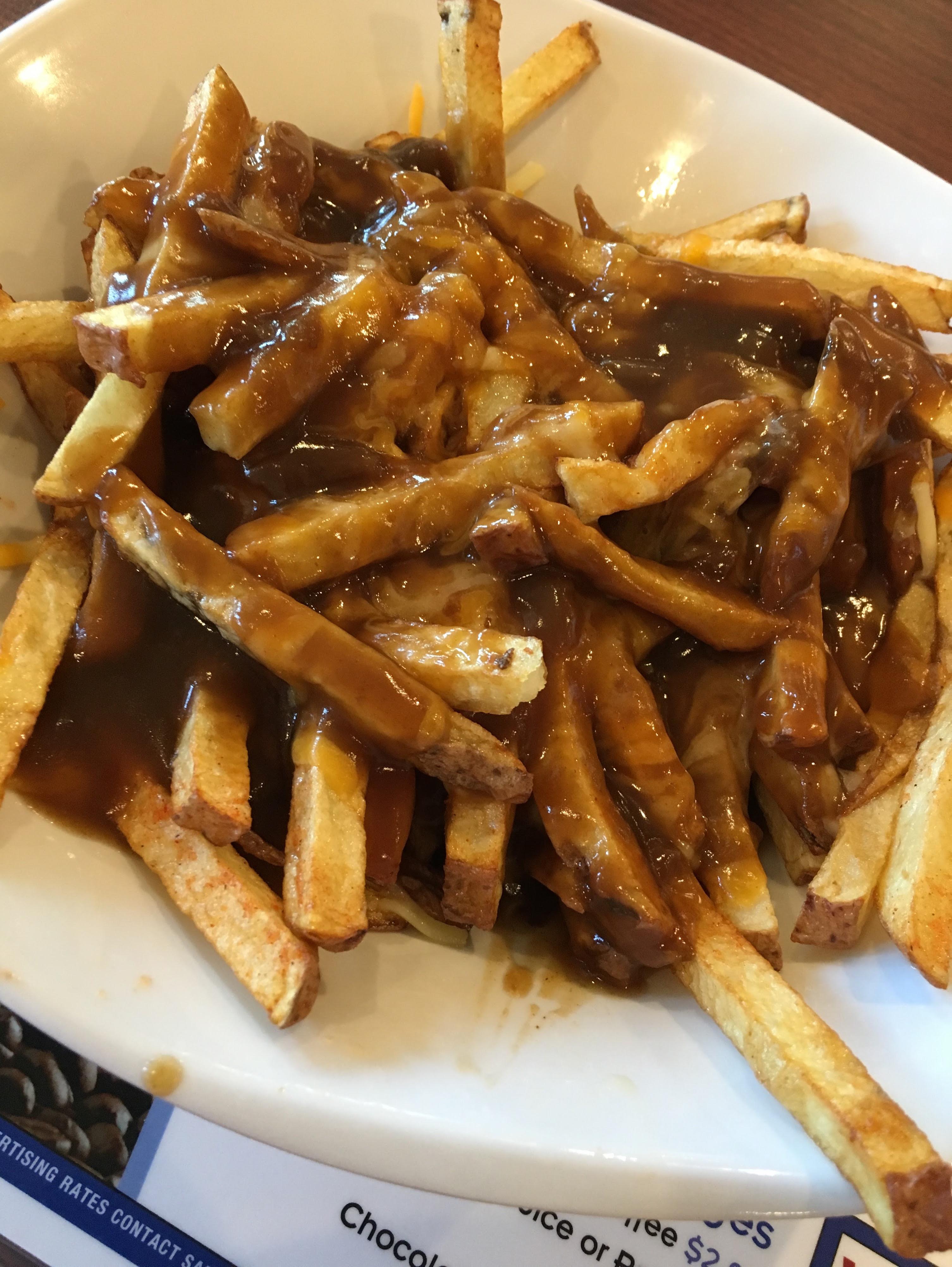 This poutine was advertised as having curds they served it with a few