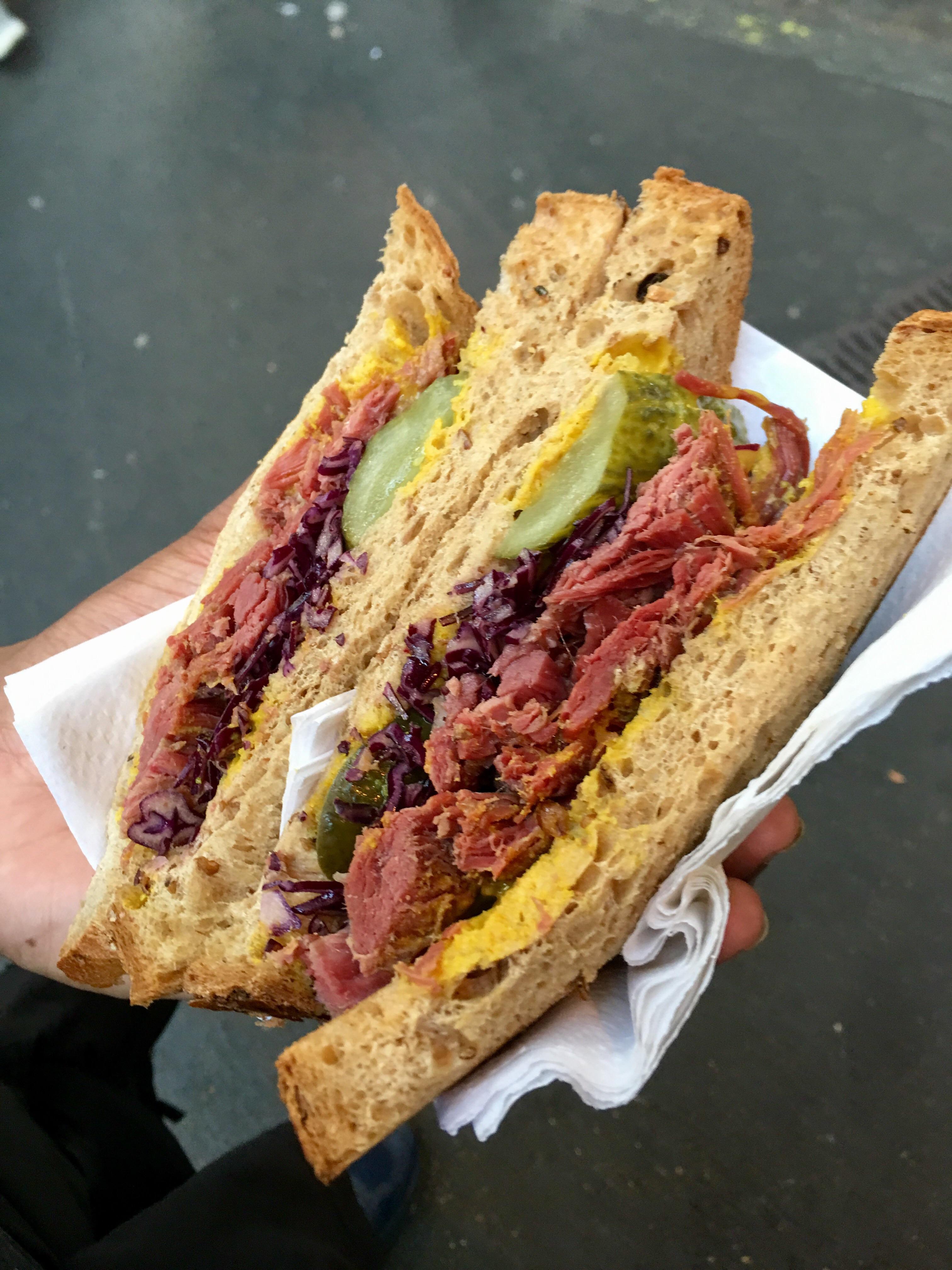Salted beef sandwich with pickles and mustard at Borough Market in