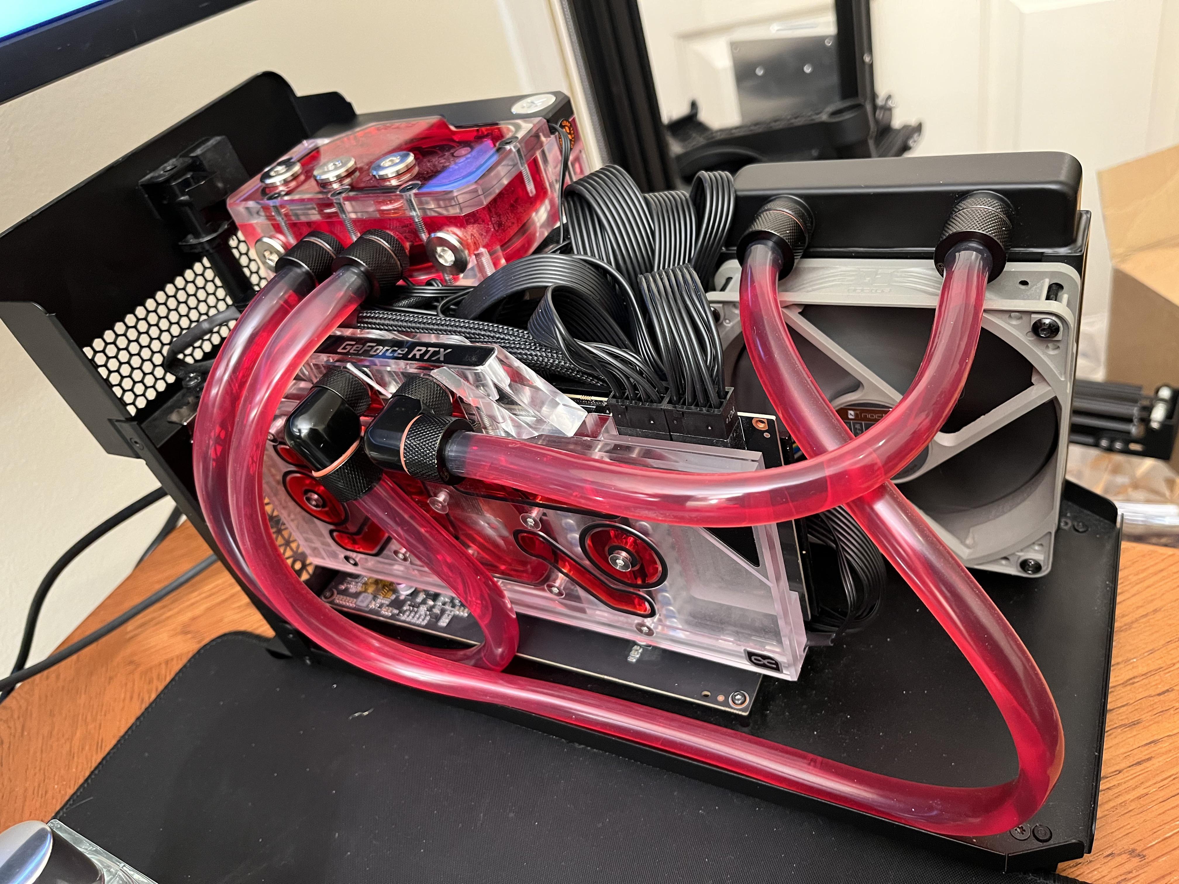 I just put a water cooled RTX 3090 in a Razer Core X. Not entirely sure