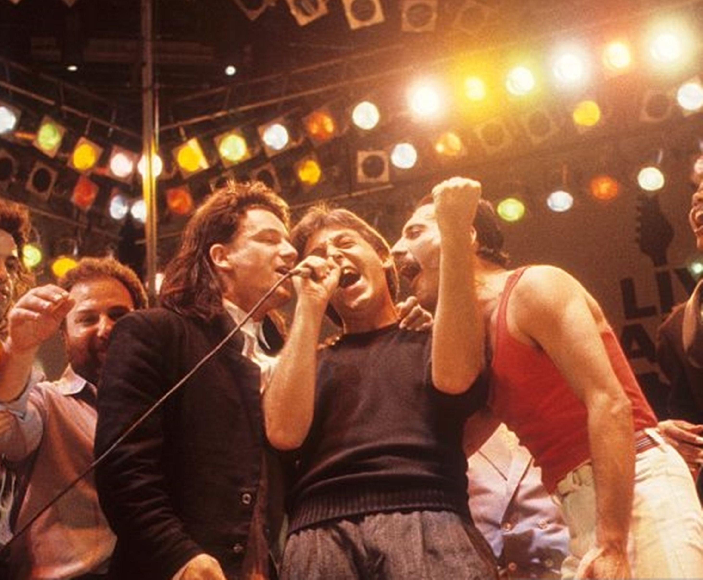 Freddie Mercury, Paul McCartney, and Bono, live aid 1985 r/OldSchoolCool