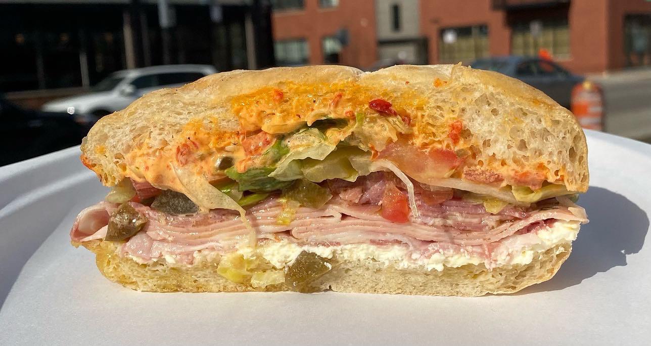 [I ate] A sandwich made with Mortadella Capicola, Smoked Lonza, Kajmak