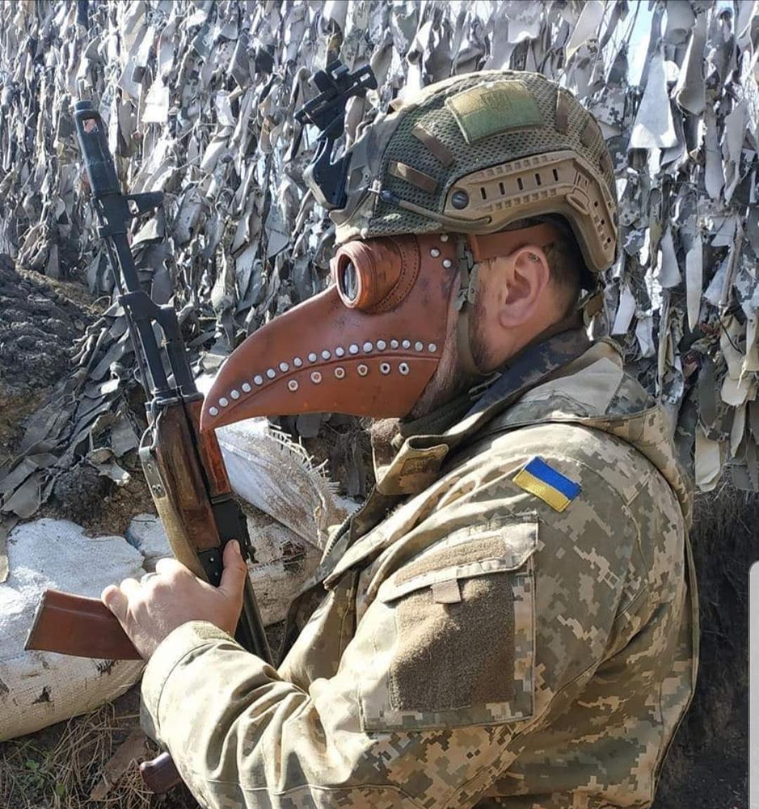 A Ukrainian soldier with an Ak74 on the frontline of the war in