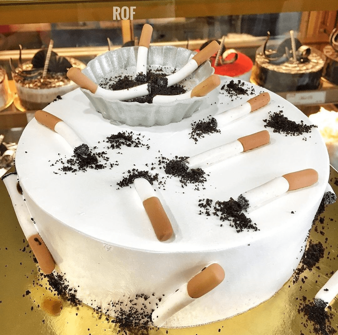 This cigarettethemed cake. r/ATBGE