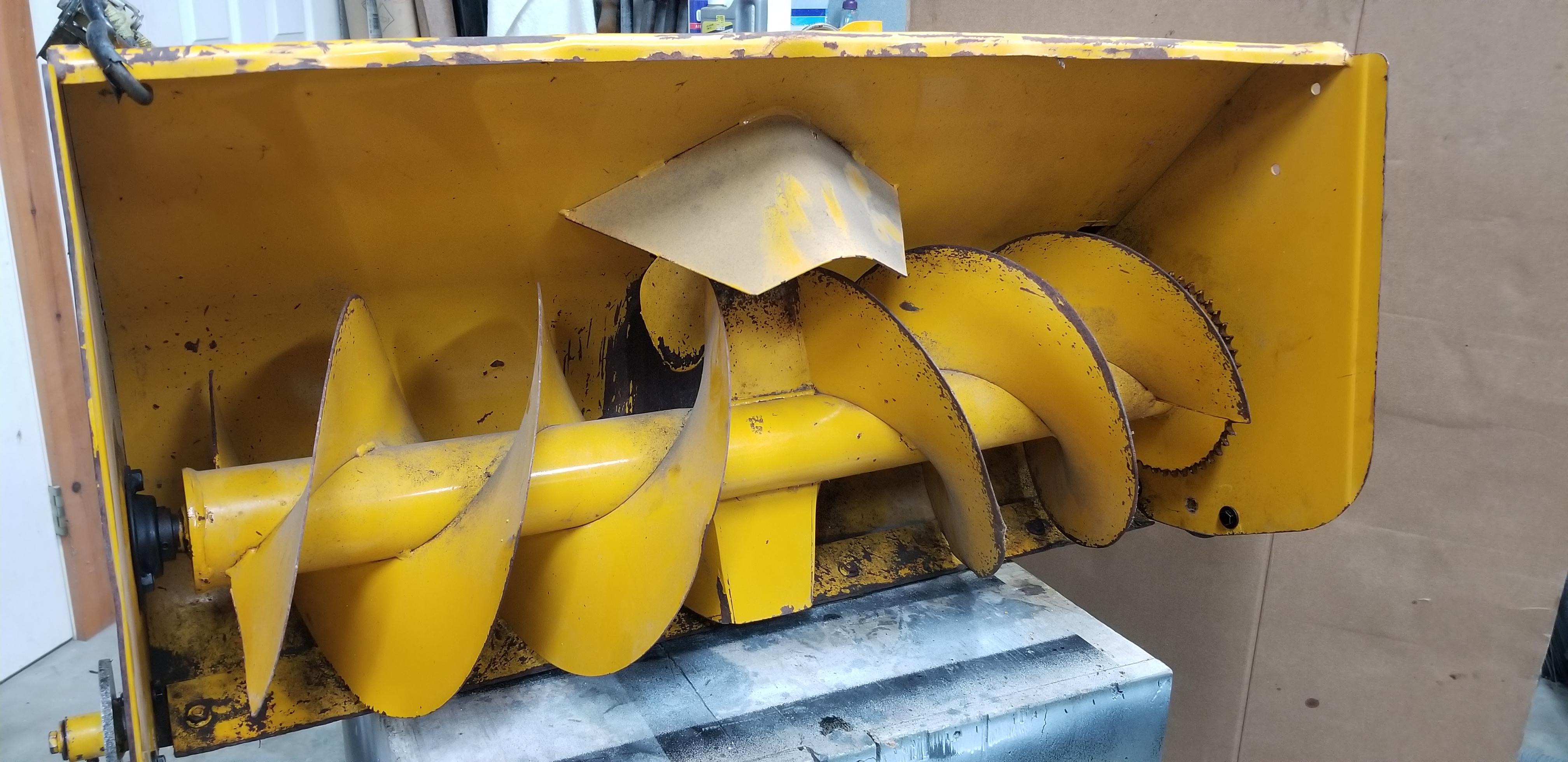 Single stage snow blower. The auger is bent about 1/2" out of line in