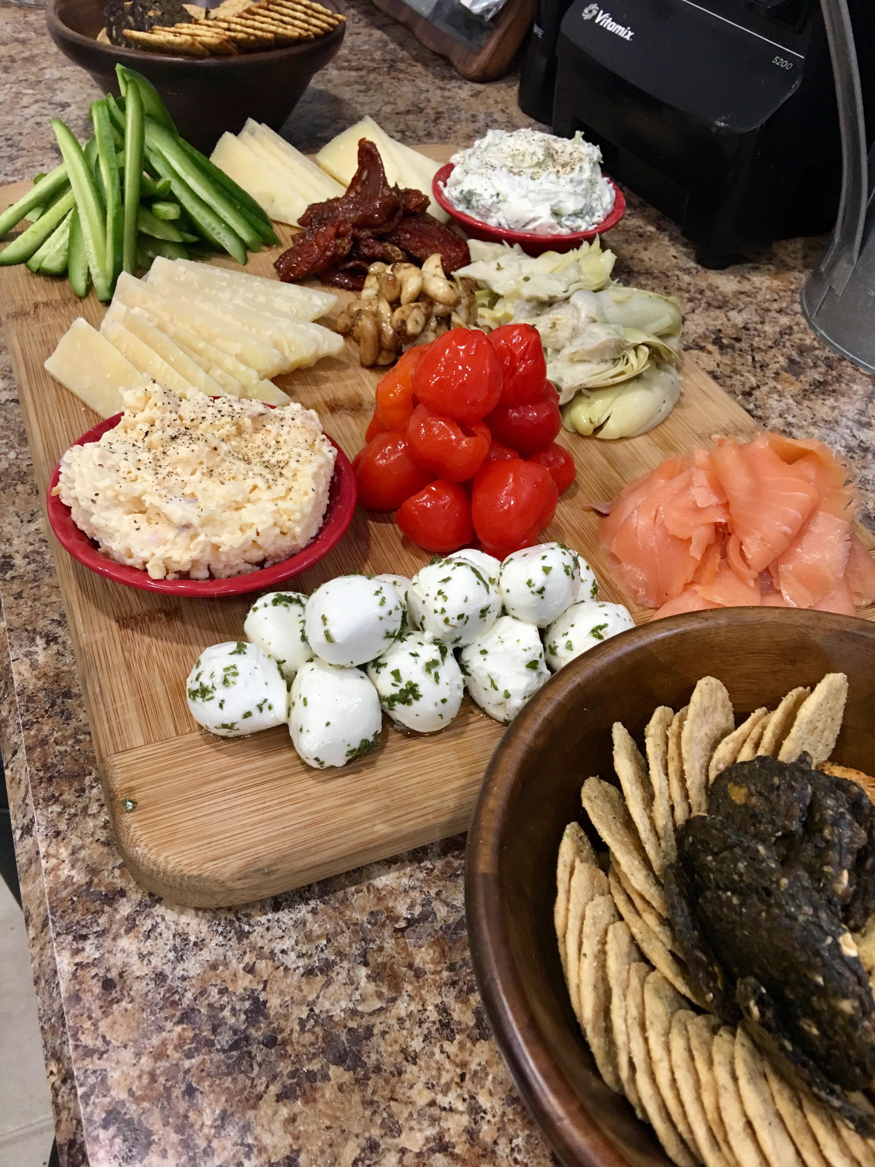 Cheese board and fixings before dinner. r/appetizers