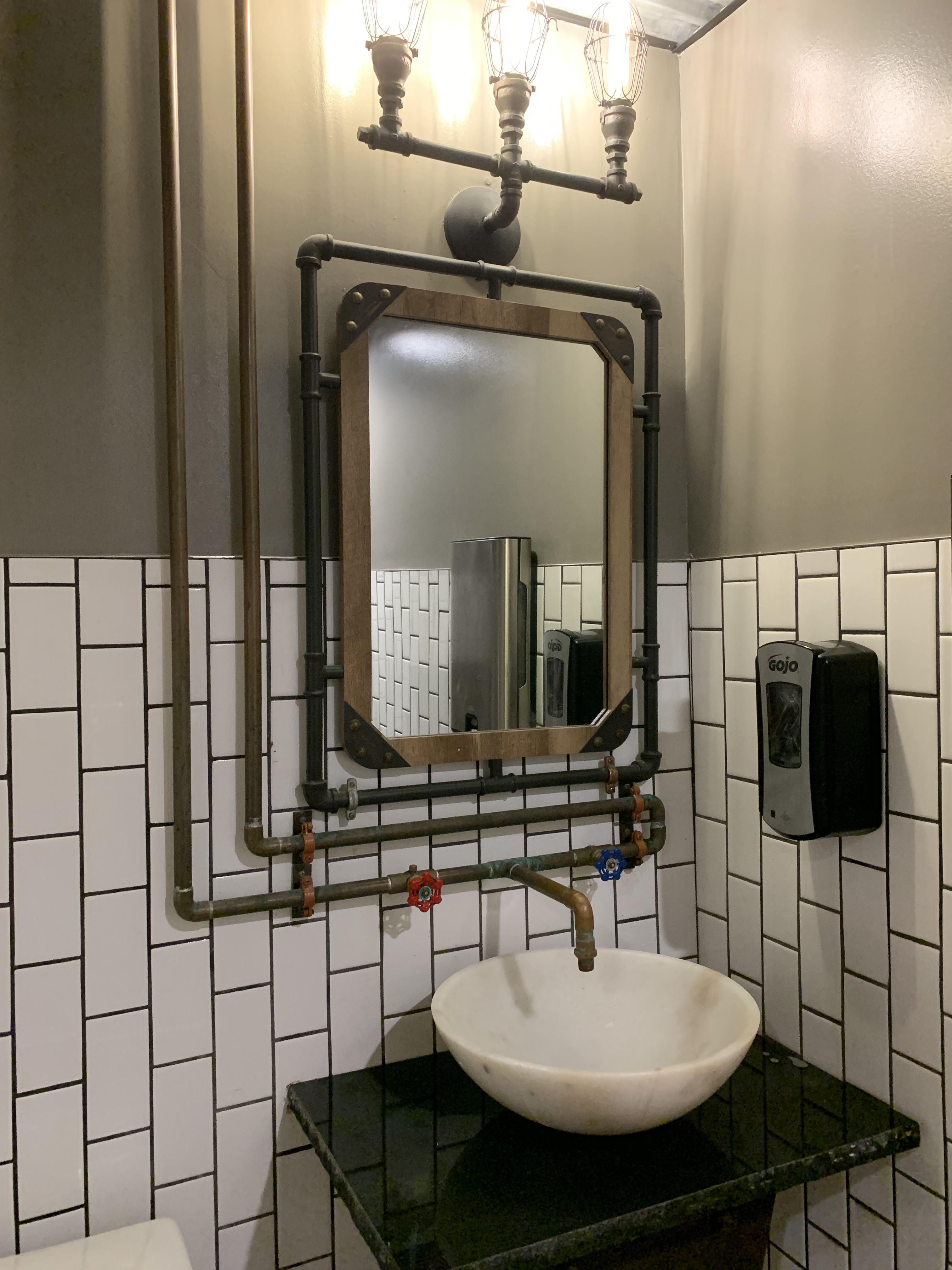 This bathroom mirror from a steampunk themed ride in Tennessee DesignPorn