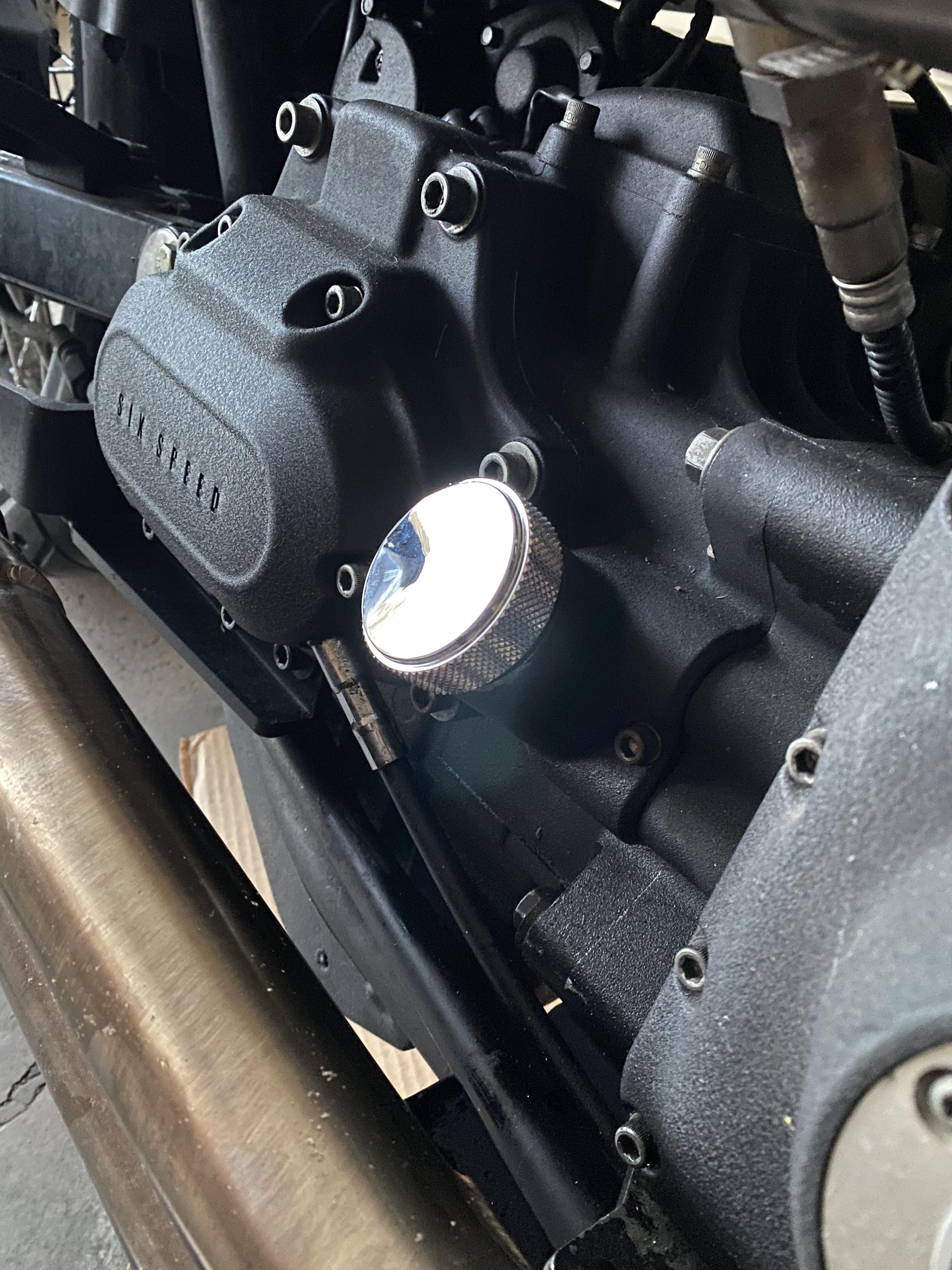 Oil cap stuck. Already drained oil so I can’t start the motorcycle to