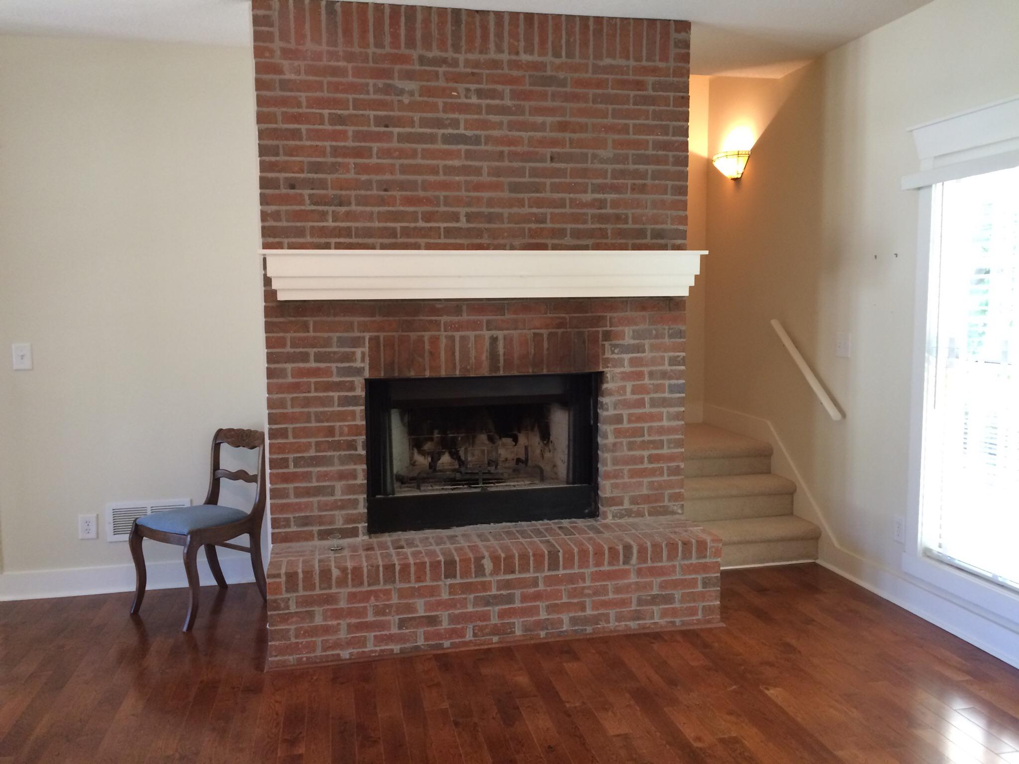 Is it a bad idea to remove this fireplace? My mom lives in a 2,000 ish square foot house and