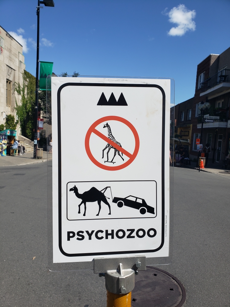 I'm visiting Montreal, and saw this sign on rue Mont Royal. What does