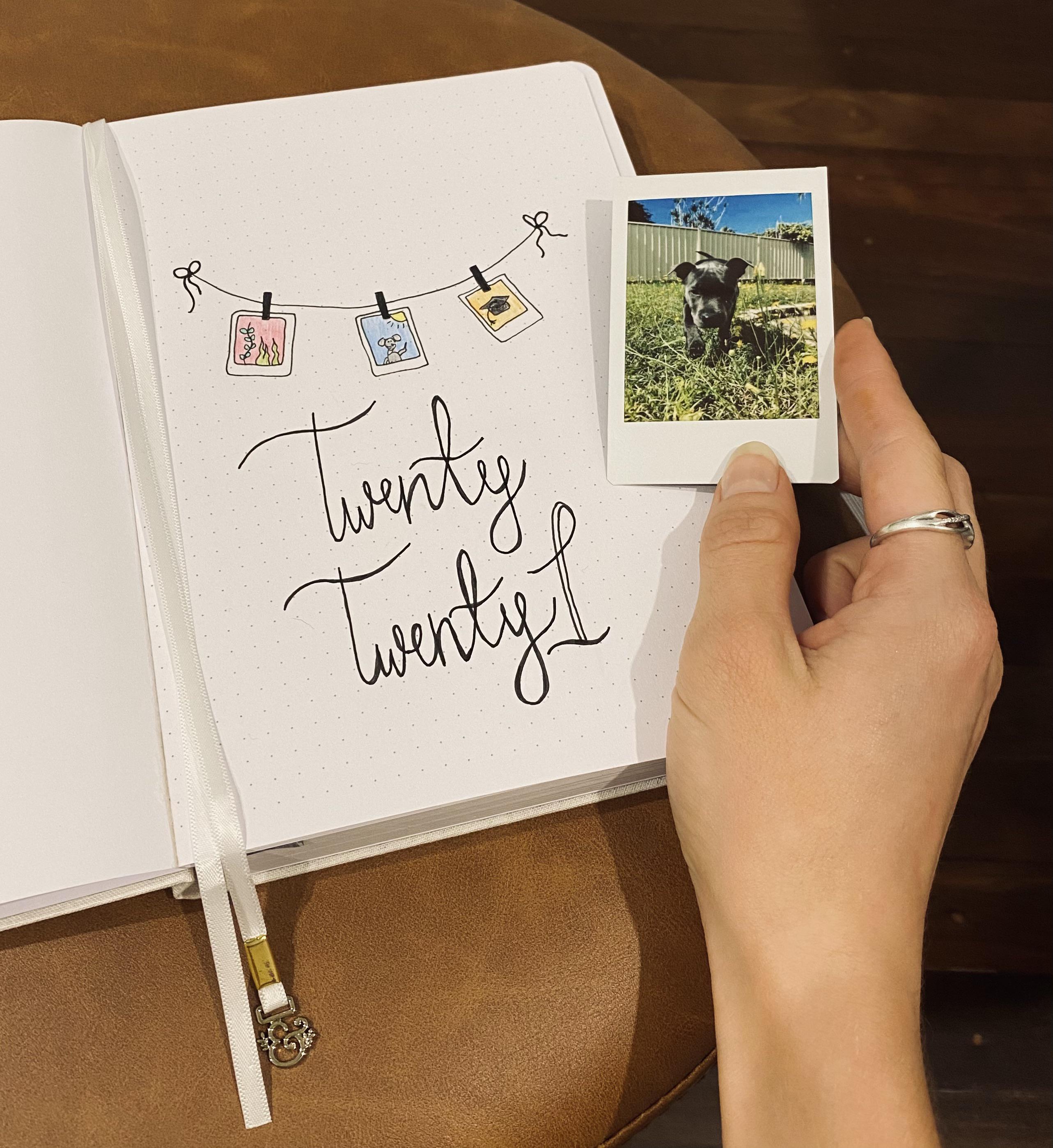 My bf gifted me a polaroid photo printer for my bullet journal.. thought this minimalist cover