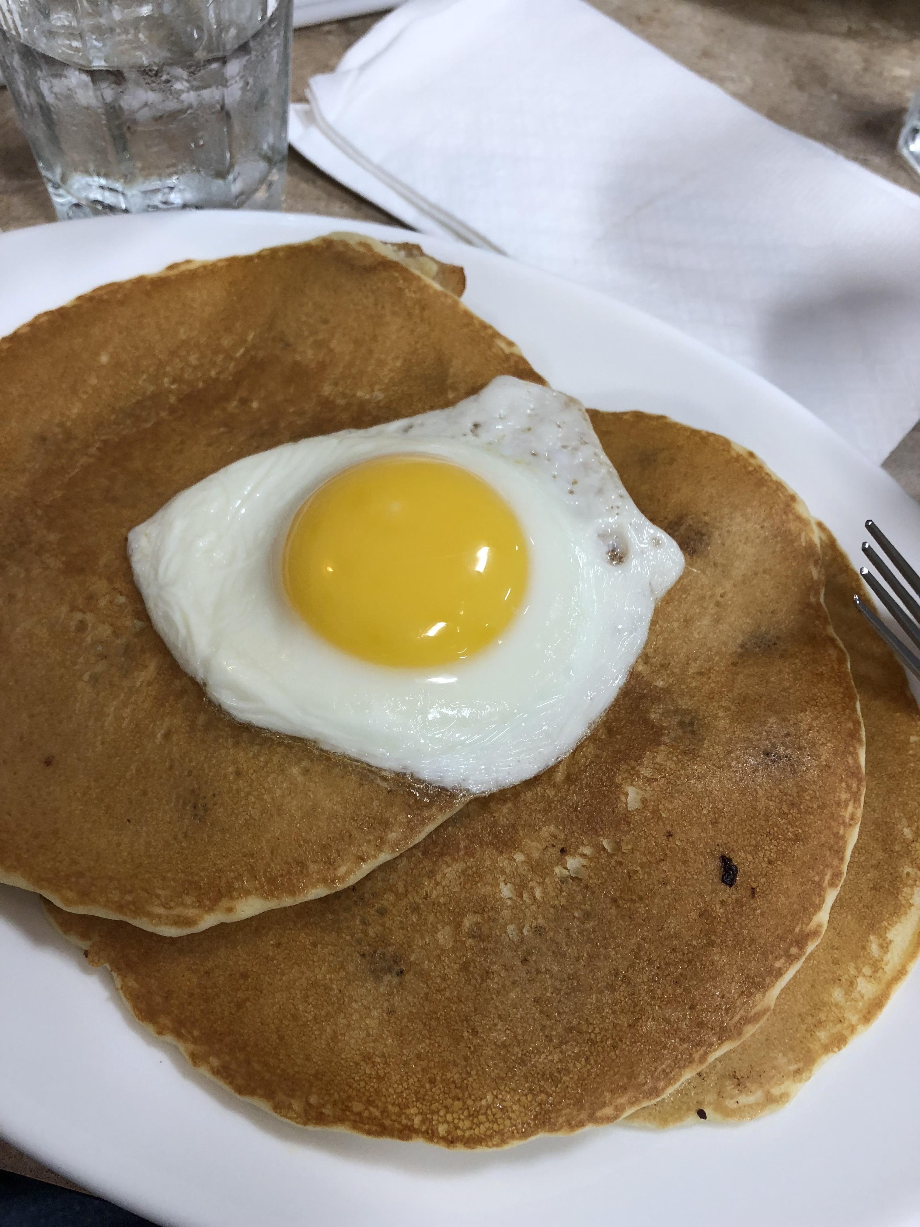 Waiter, would you please put an egg on my pancakes? r/PutAnEggOnIt