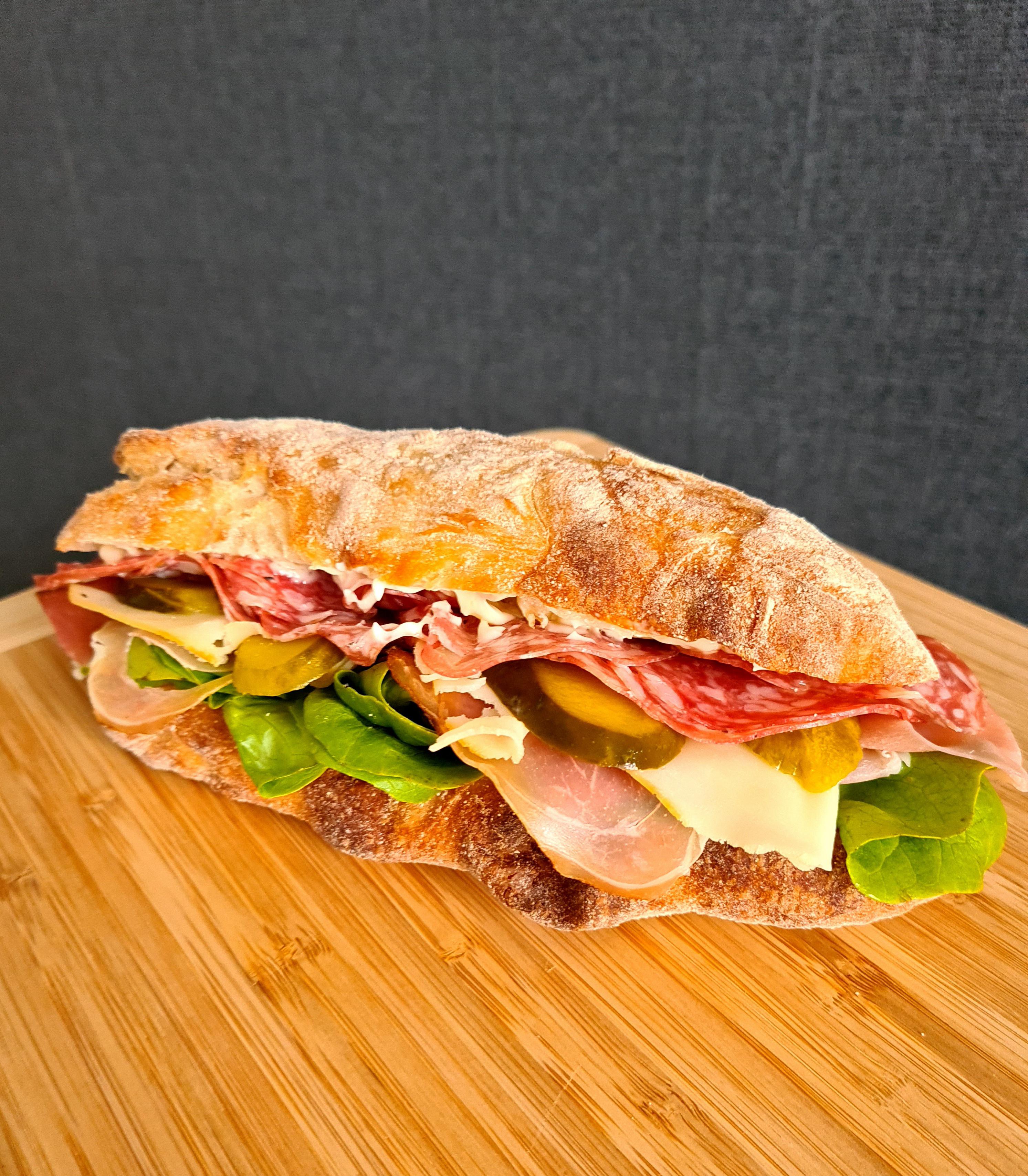 [Homemade] Ham, salami, Swiss, with spinach, pickles and mayo on a soft