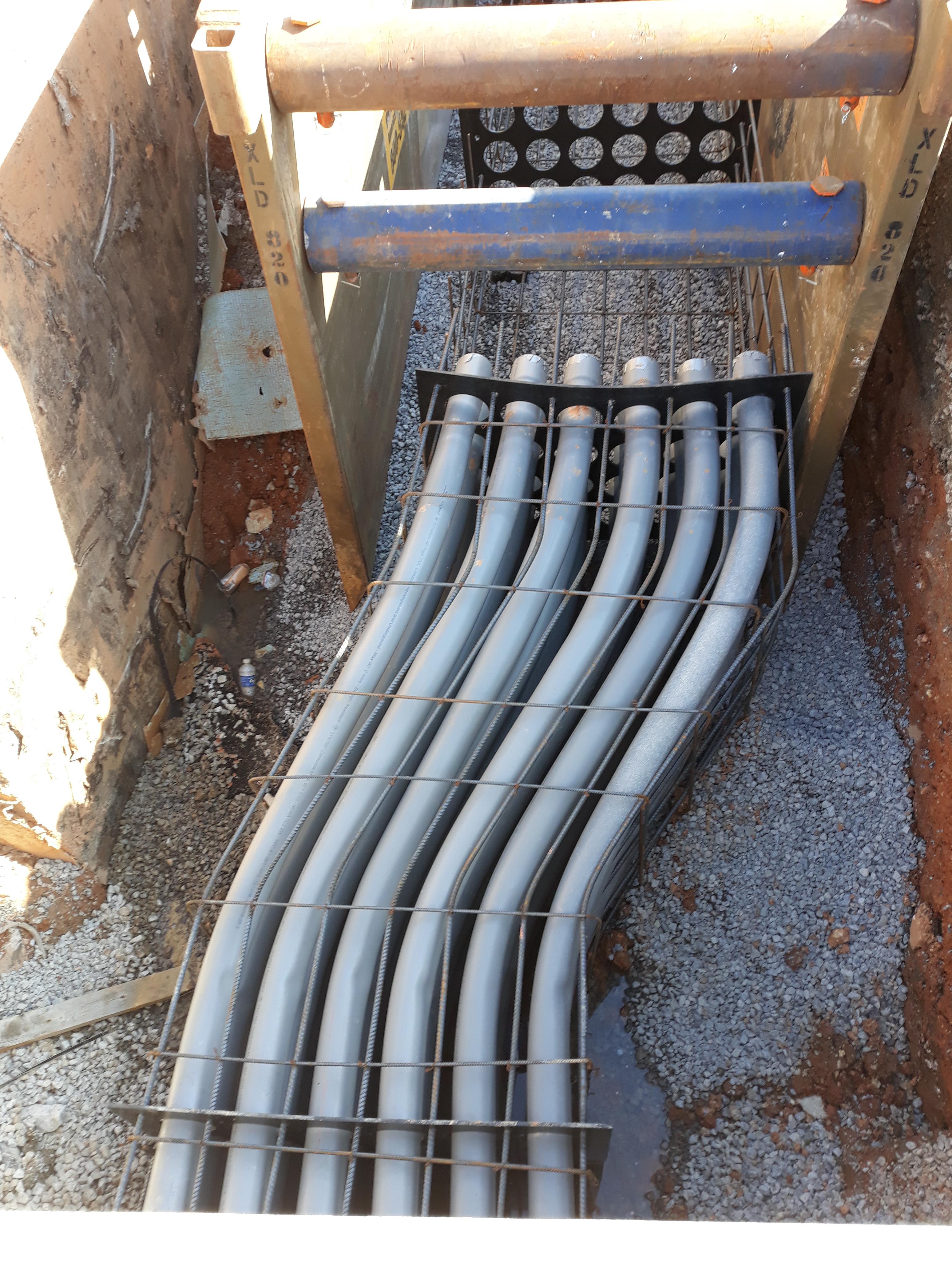 244" duct bank with a 3' rolling offset from a pull vault. 9' in the