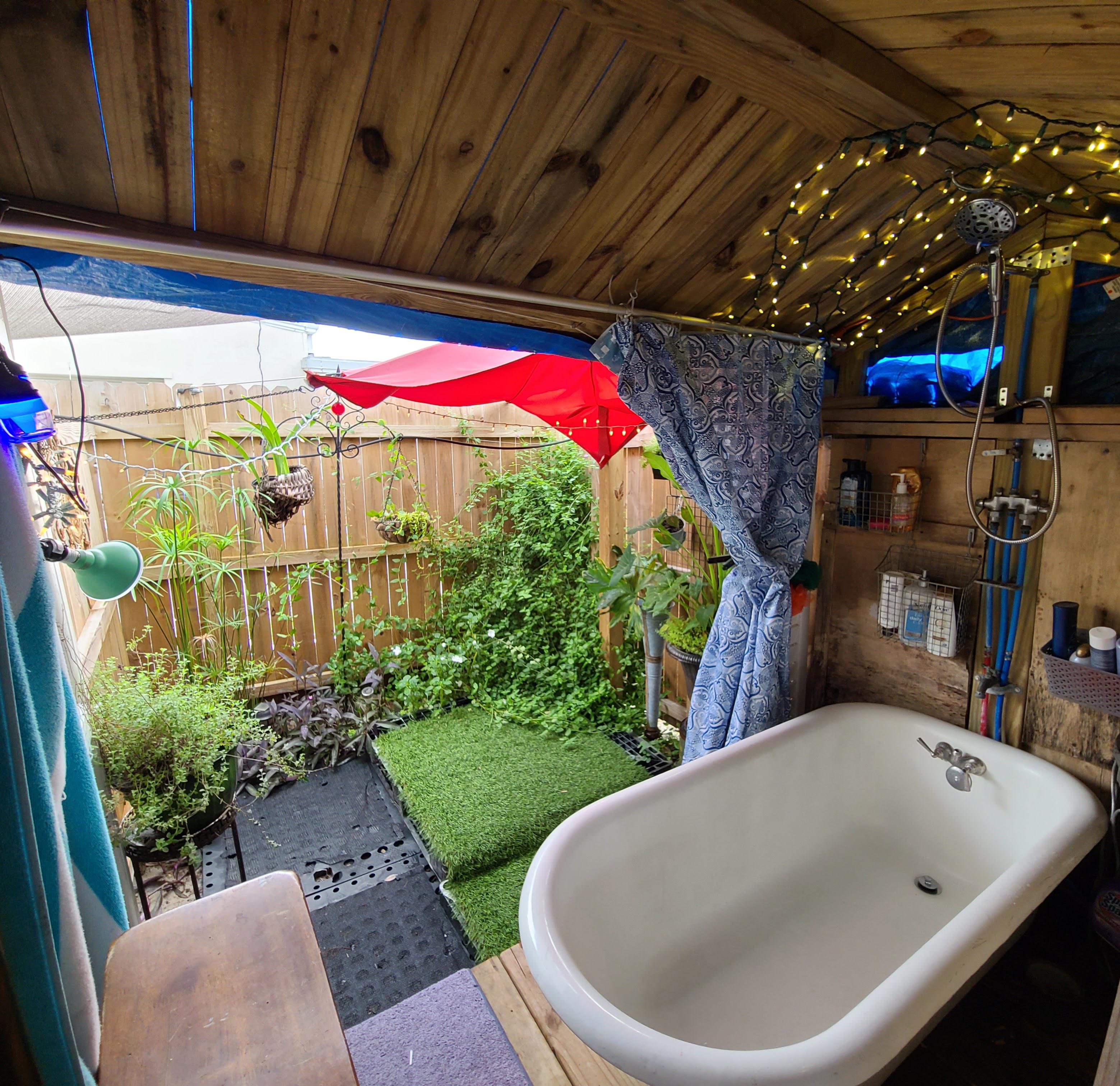 Outdoor bath house I built. Iron claw foot tub r/CozyPlaces